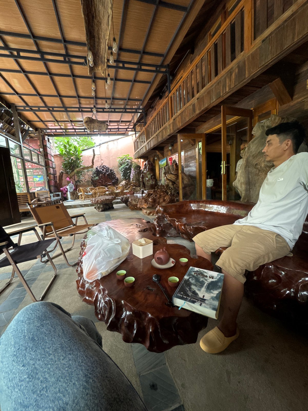 Morning leisure moments captured at Vietnamese outdoor dining area