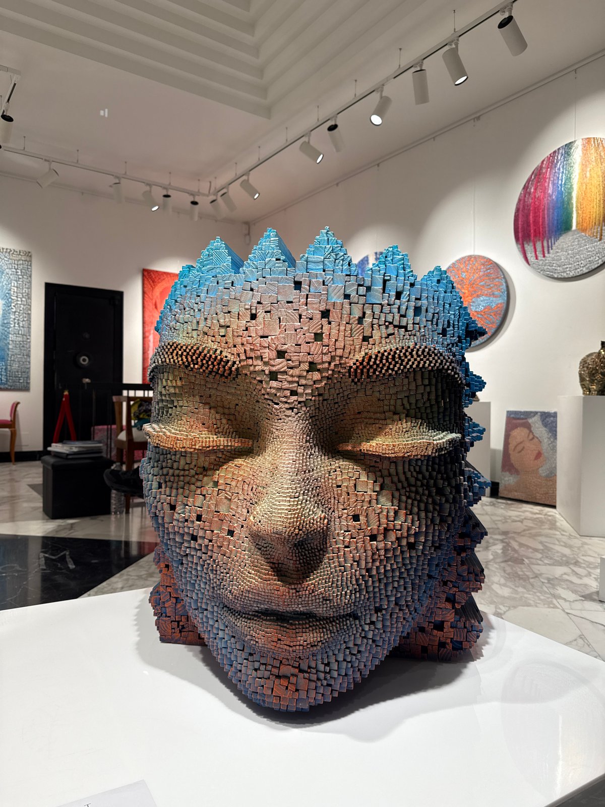 Contemporary art exhibition observed in Milan gallery Friday evening