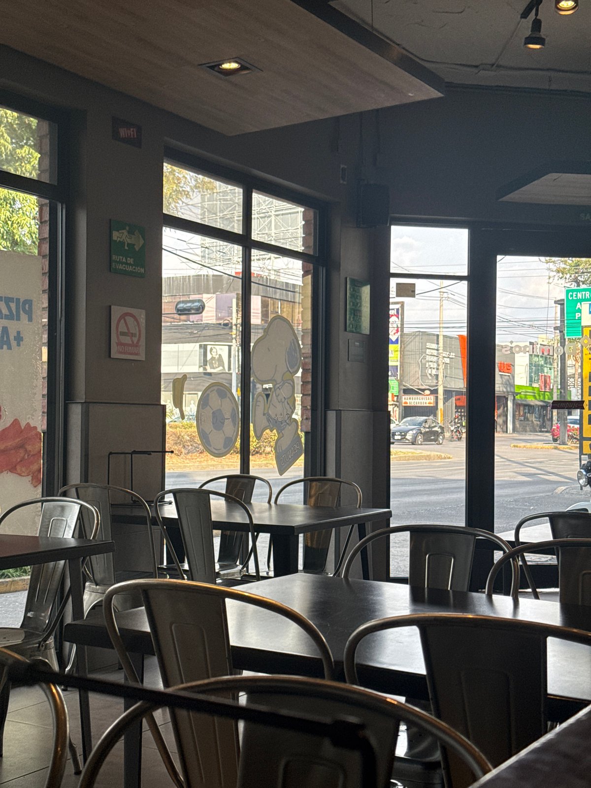 Restaurant with Snoopy decorations observed in Puebla, Mexico