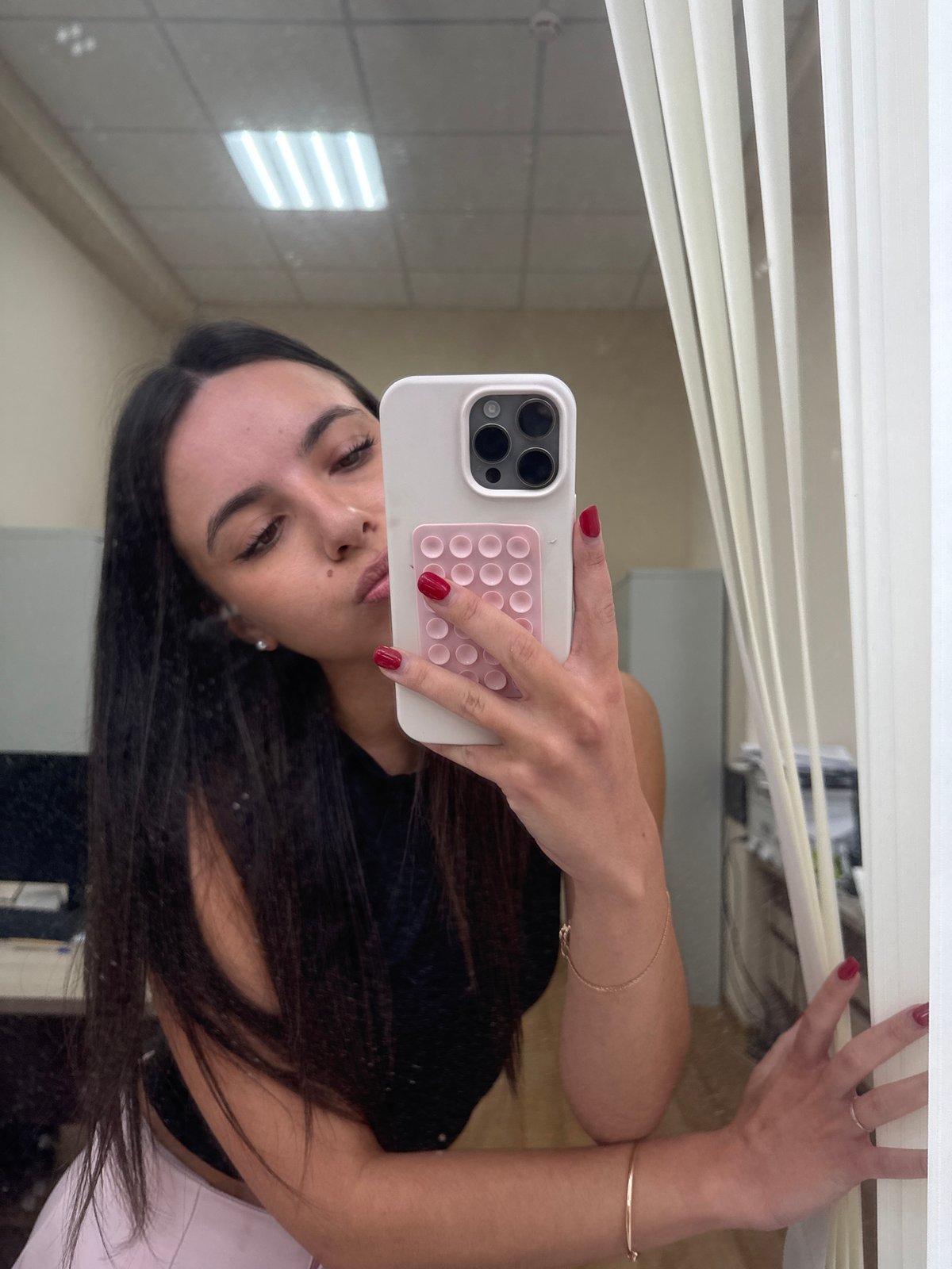 Mirror selfie, food container, and a duckling plate