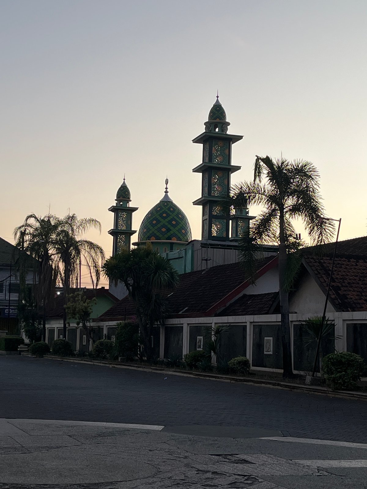 Dusk settles over everyday street life in rural East Java