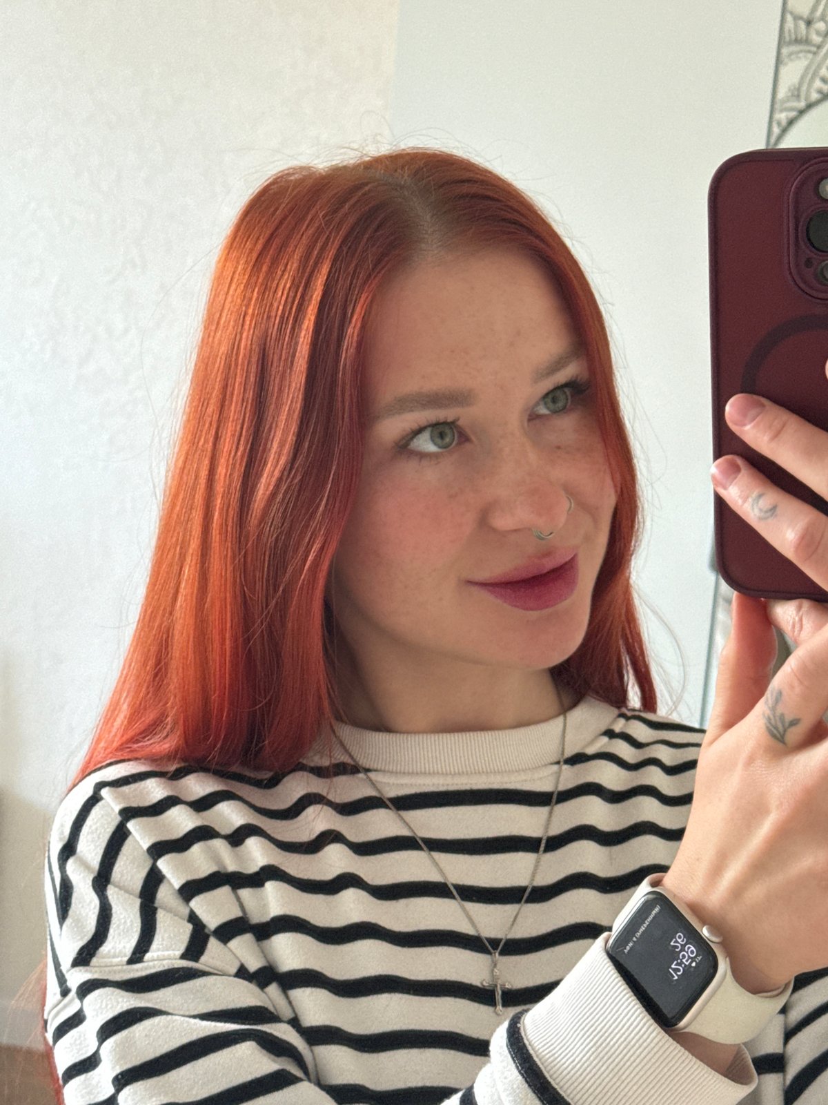 Woman documents morning routine with selfies, cat, cookie in Rostov-on-Don