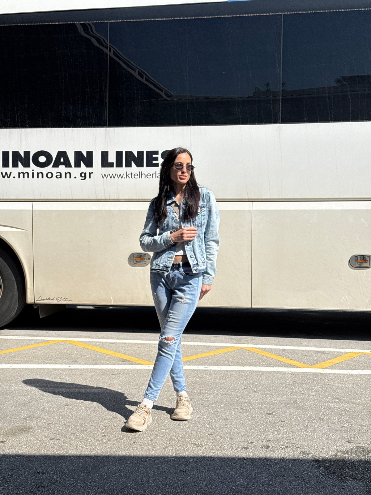Woman photographed at bus stop and nail salon in Chania