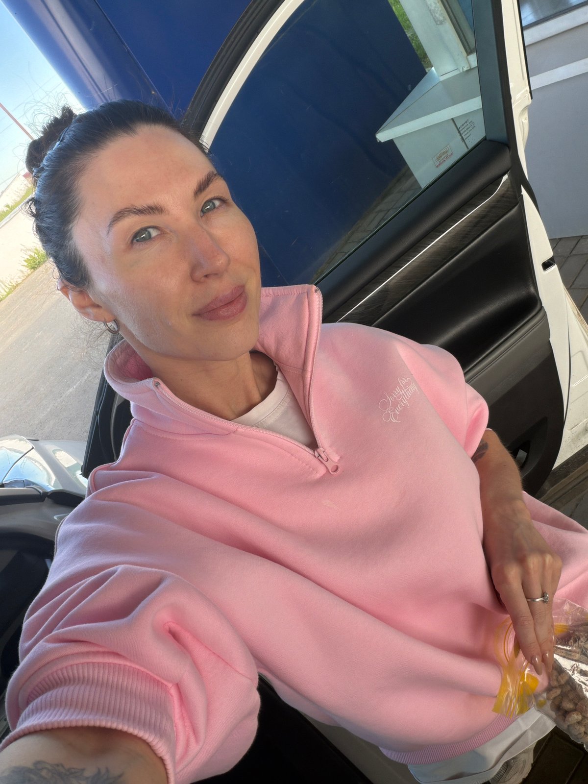 Woman photographed, takes selfie in Ильинское, Russia early morning
