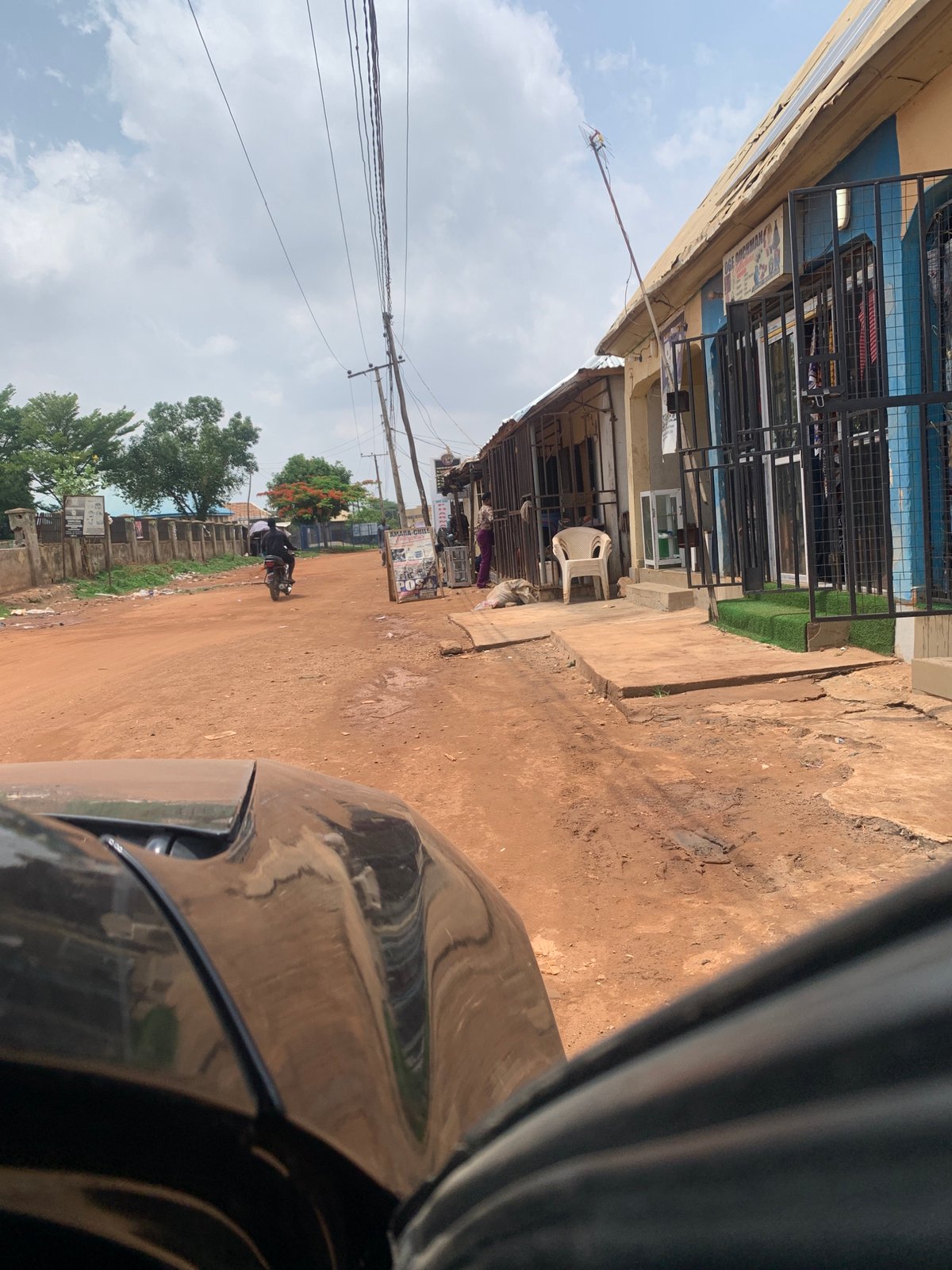 Daily street life documented in Madalla, Nigeria commercial district