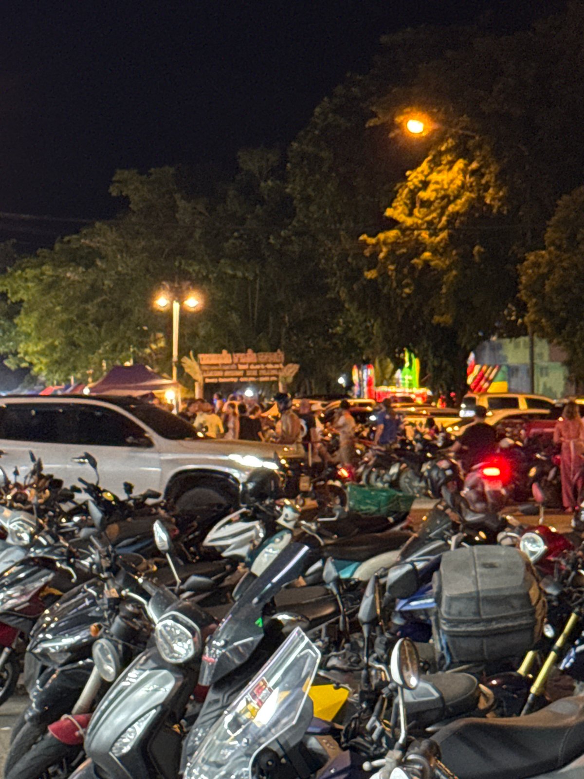 Night festival with shadow puppets, food stalls documented in Koh Phangan