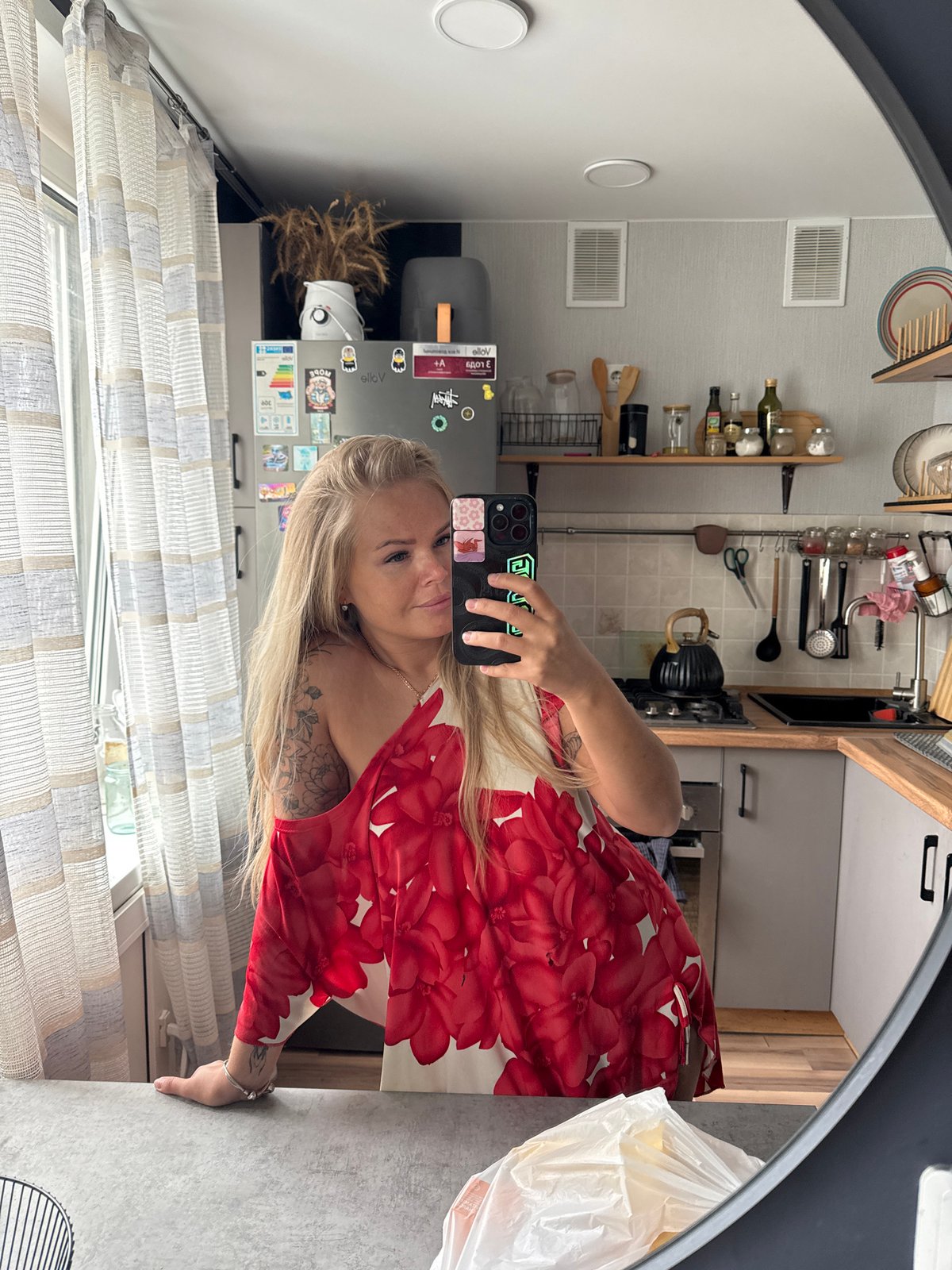 Woman takes mirror selfies in different outfits Thursday morning