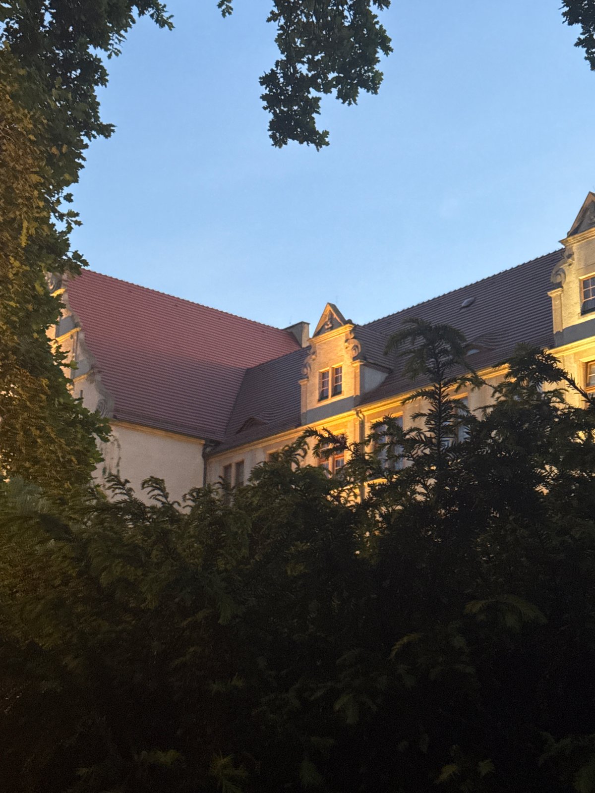 Sunset scenes documented across Poznan cityscape during evening hours
