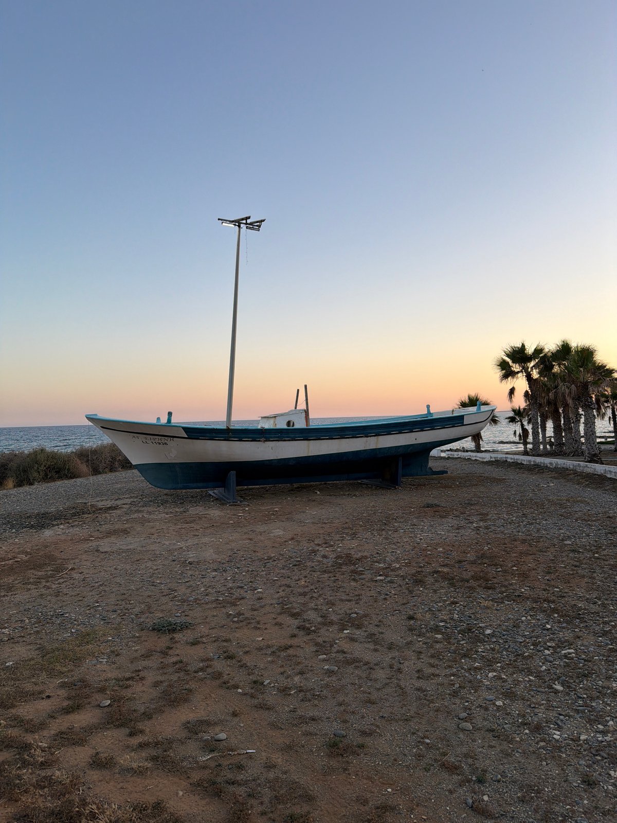 Woman documents sunset visit to Pervolia coastal area, Cyprus