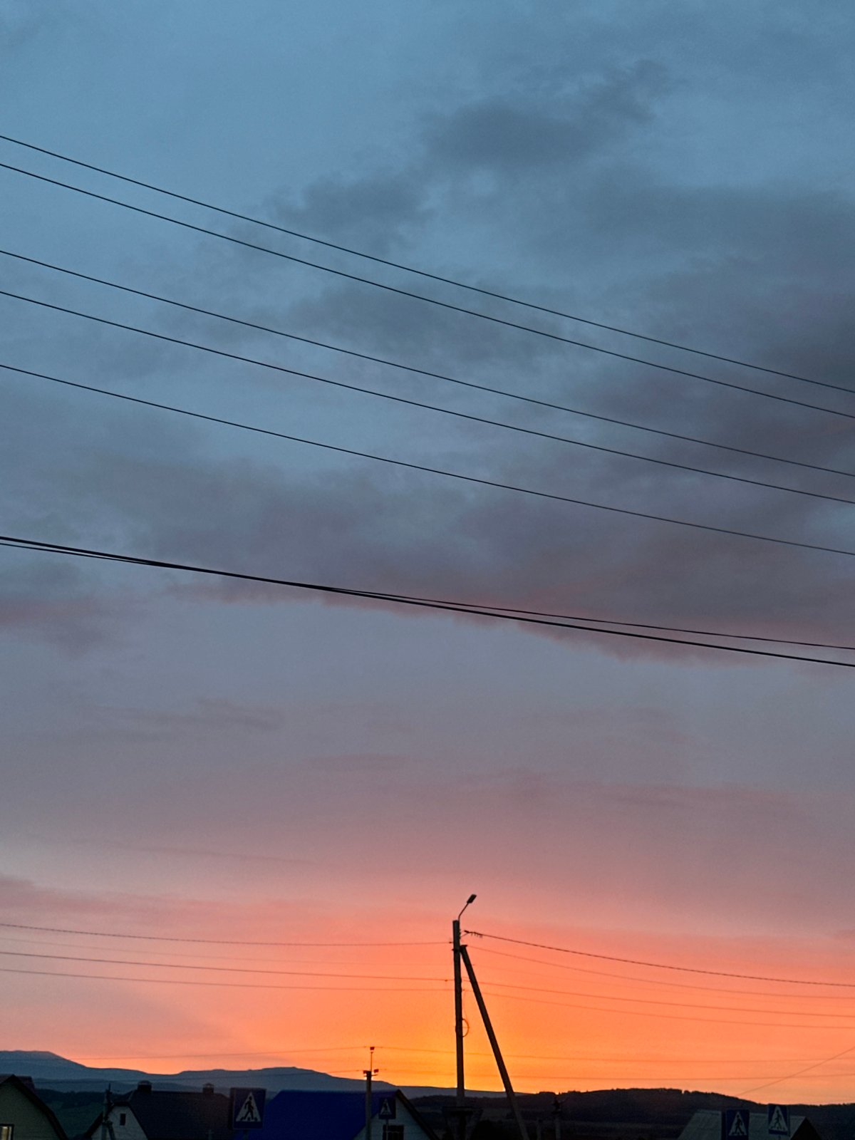 Dramatic sunrise or sunset photographed in rural area