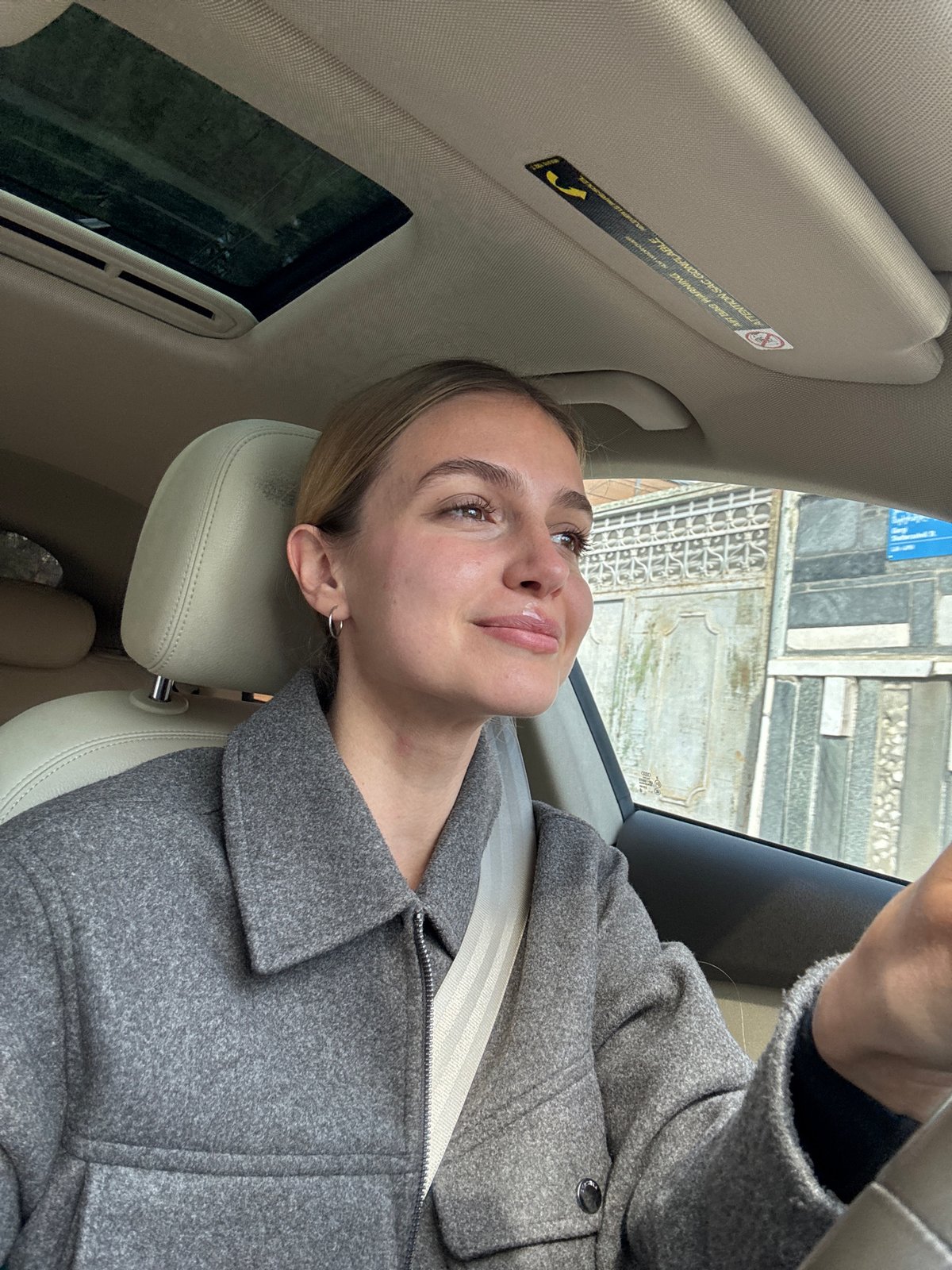 Woman documents early morning journey from vehicle to elevator