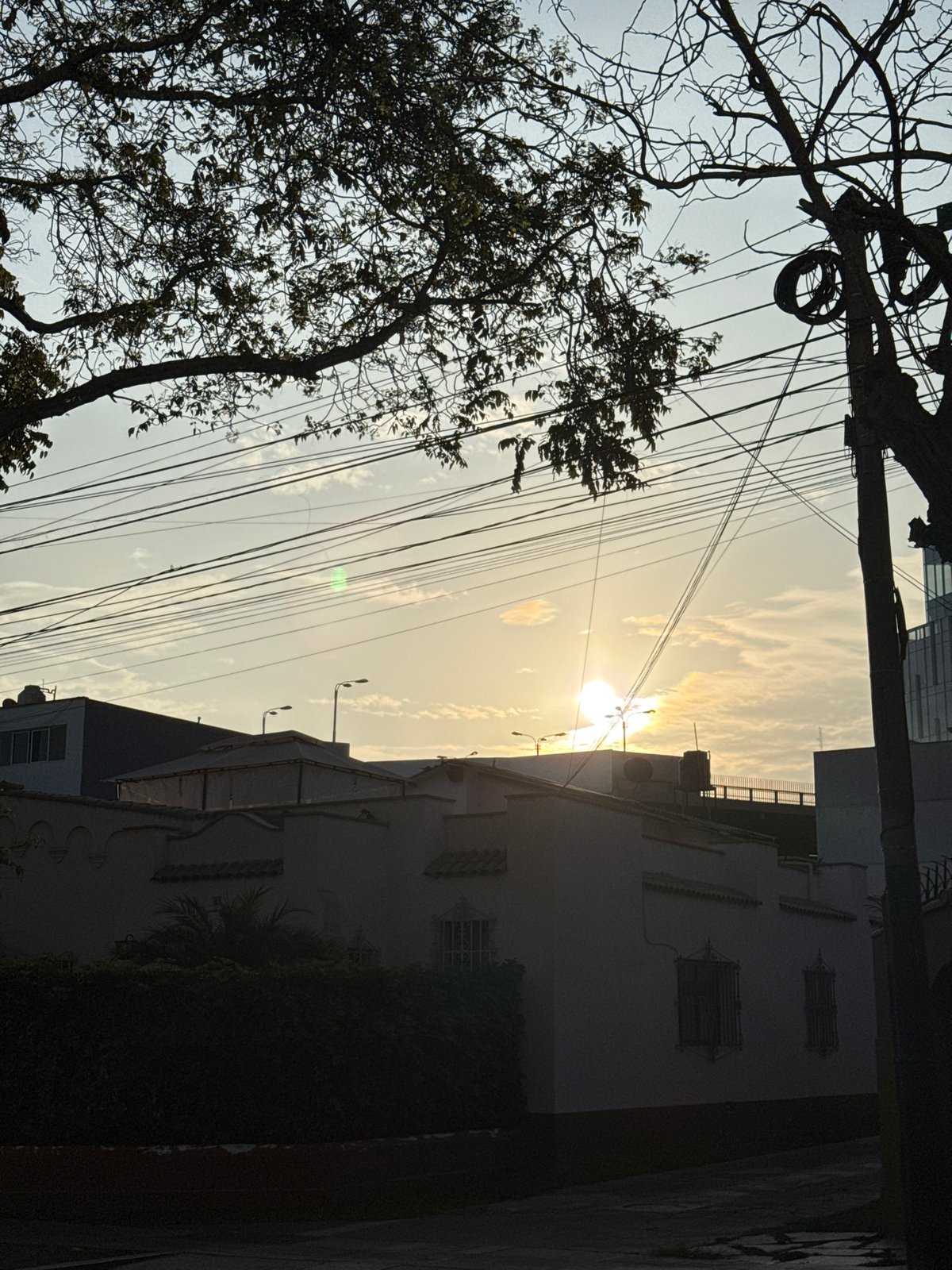 Evening street scenes documented across San Isidro, Miraflores districts