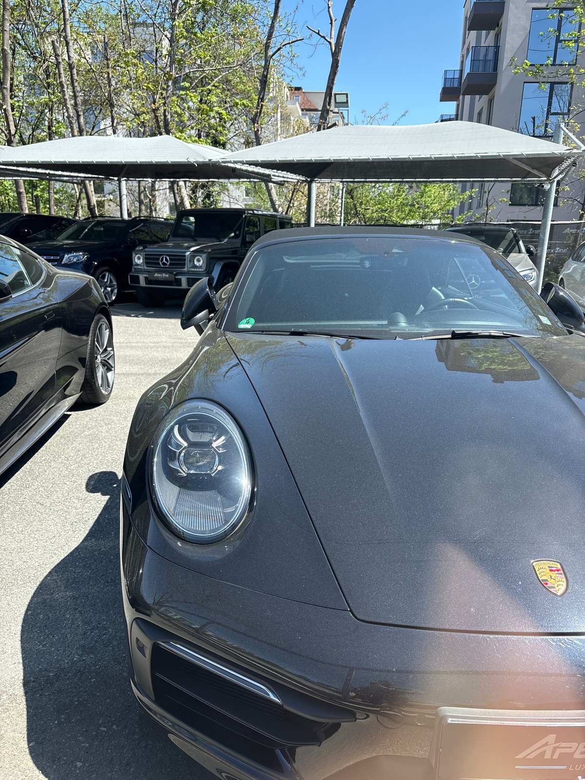 Ordinary moments captured across Sofia: luxury car, instant noodles, construction
