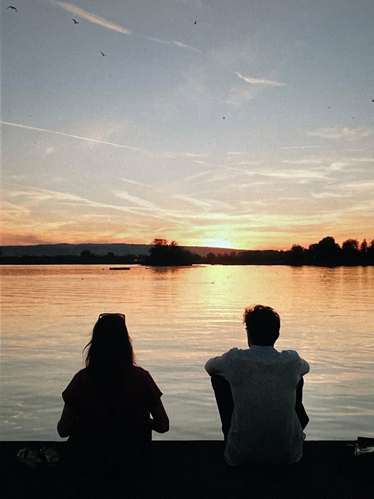 Sunset watchers gather along Saint Petersburg waterways