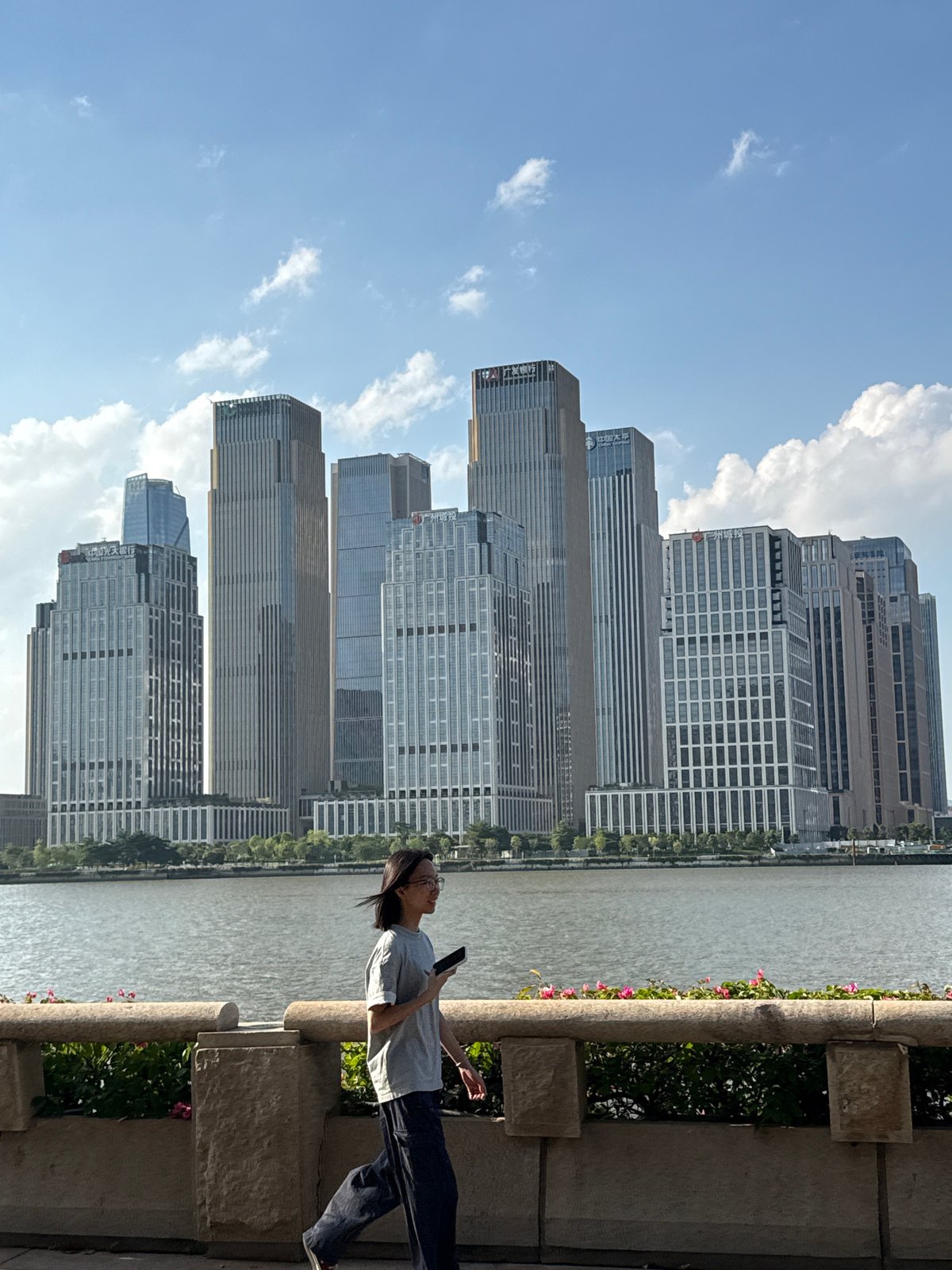 Haizhu waterfront promenade and streets on a clear summer morning