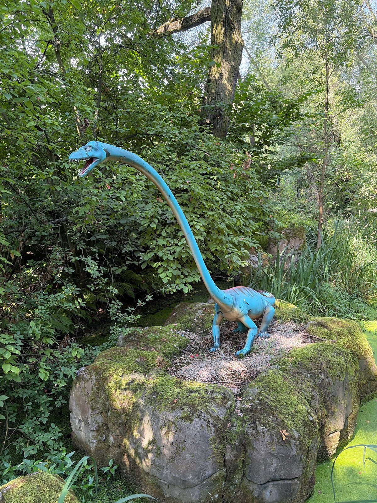 Walking through a dinosaur park in Zator, Poland
