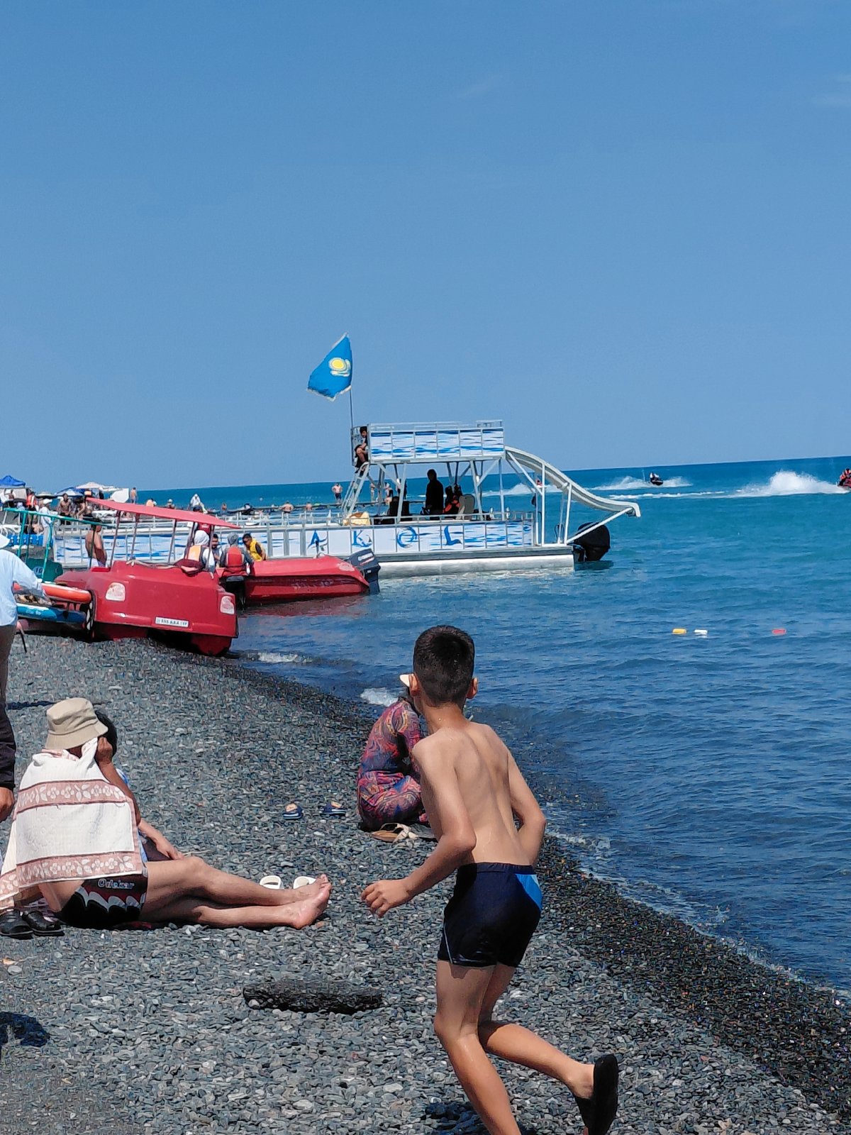 A lazy summer day on Lake Balkhash's pebble shore