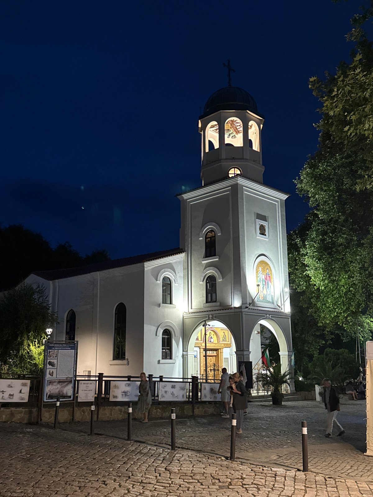 Nighttime stroll through a European town's historic streets and churches