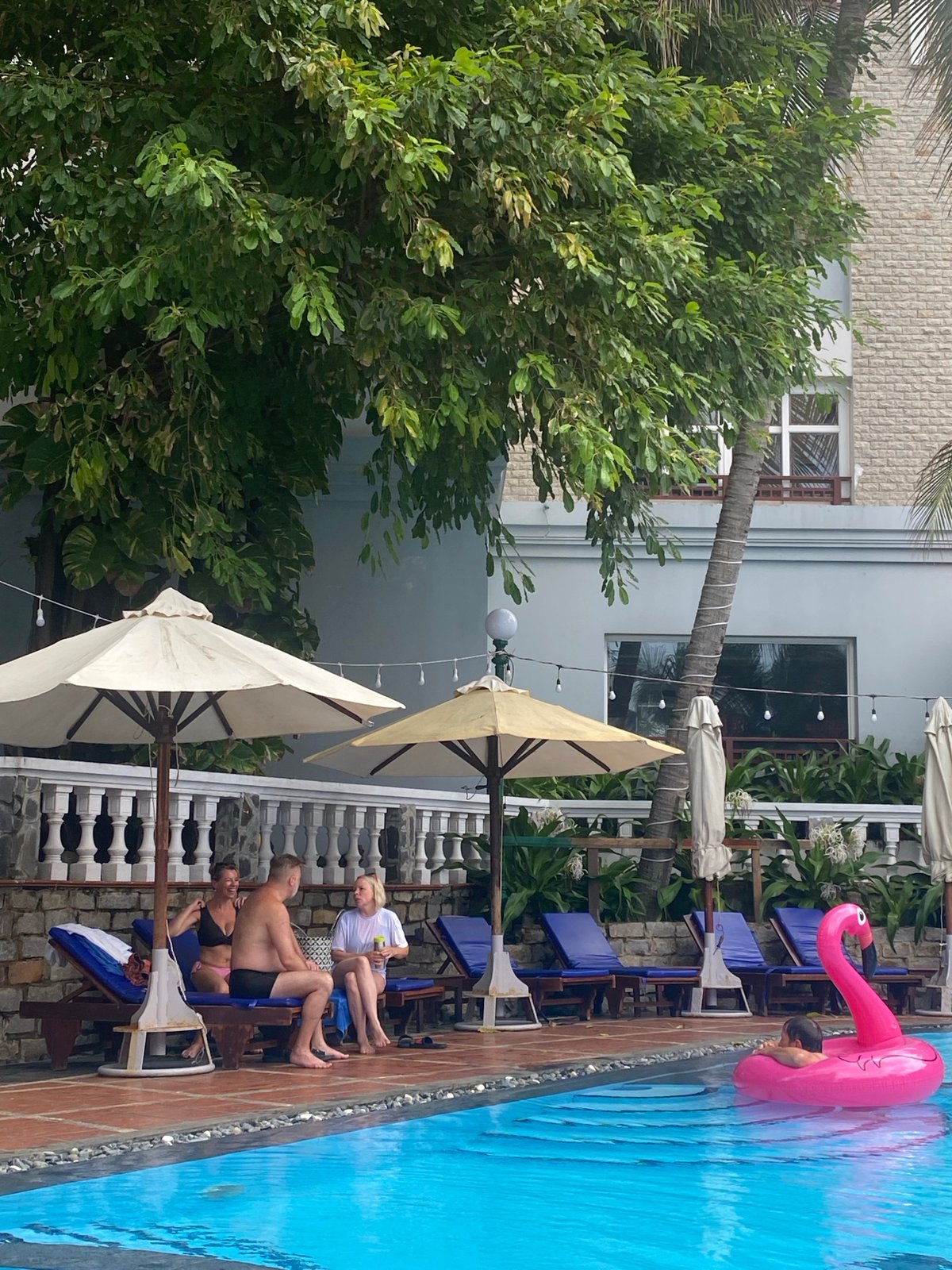 Poolside and garden life at a Mũi Né resort