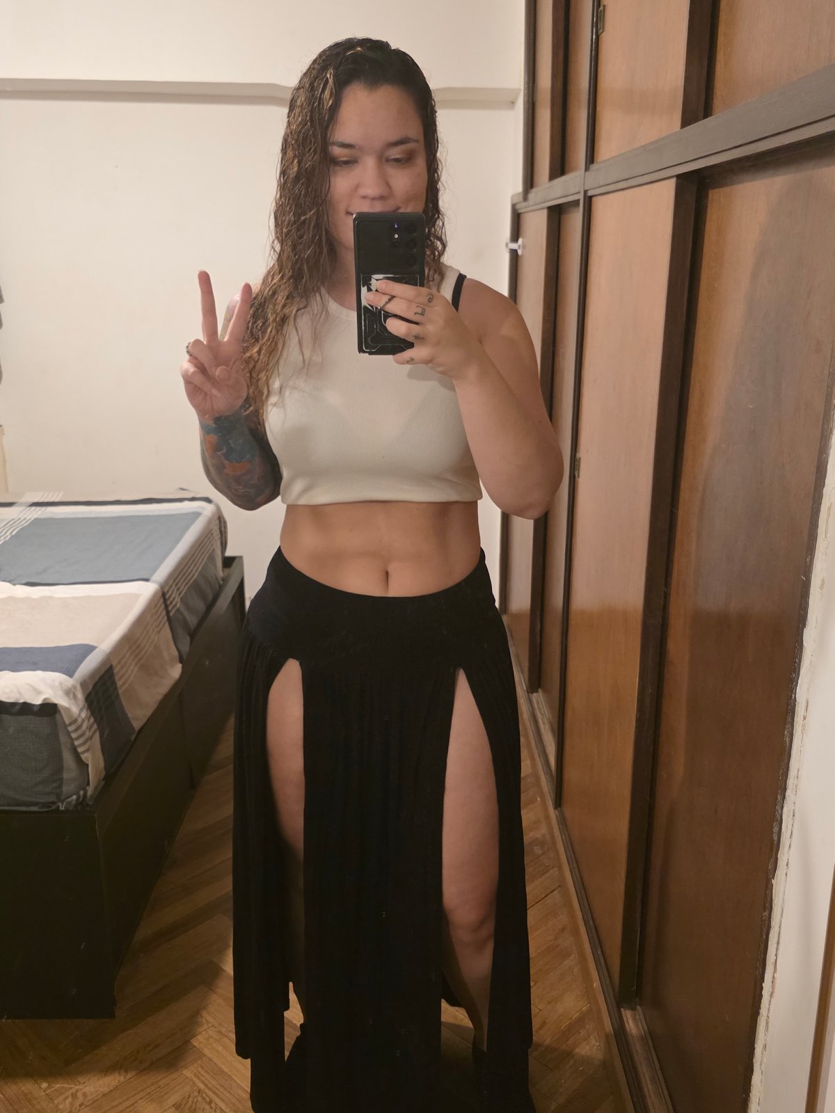 Woman takes mirror selfies at home in Buenos Aires