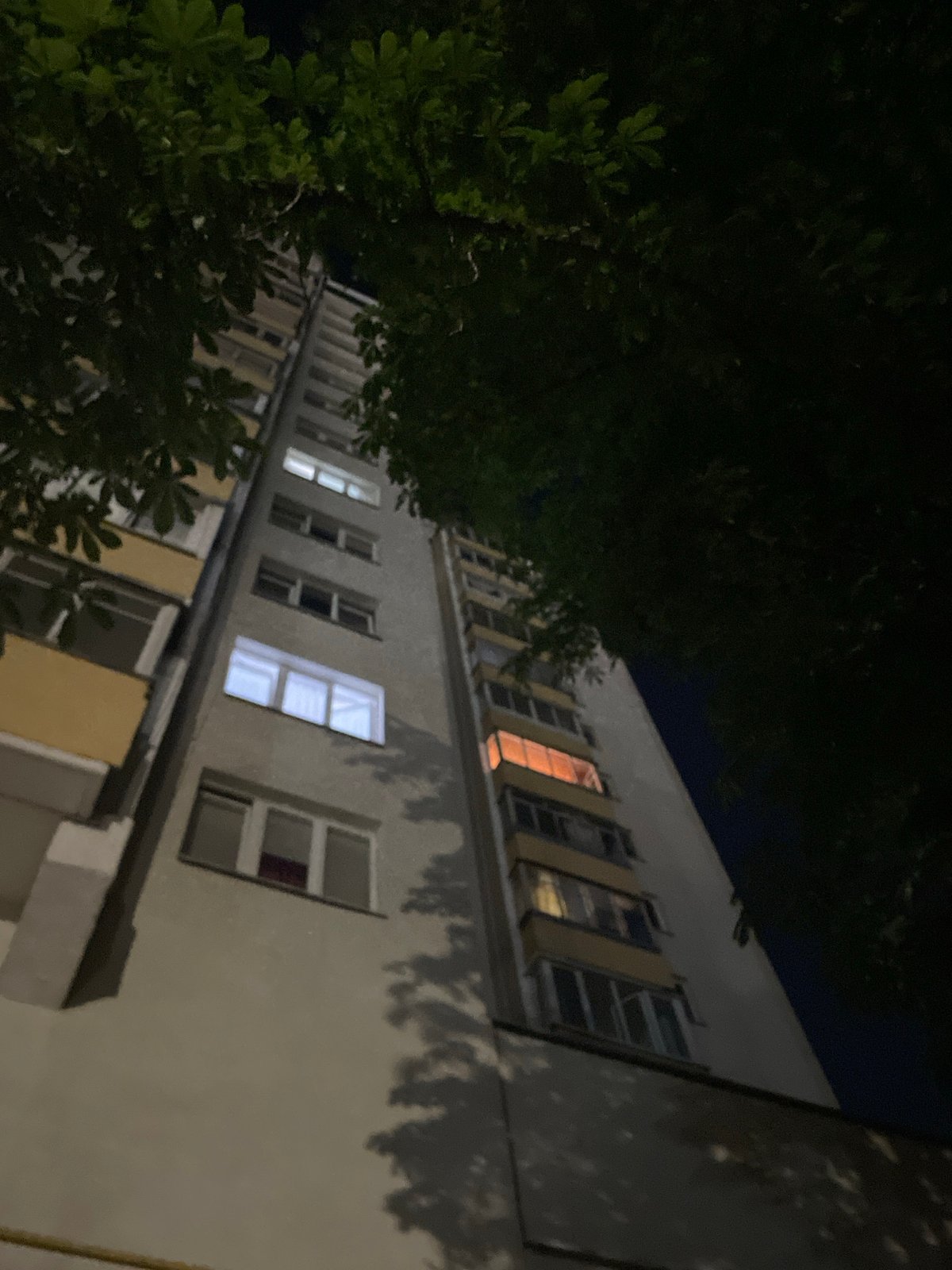 Late-night walk around an illuminated stadium and its surroundings