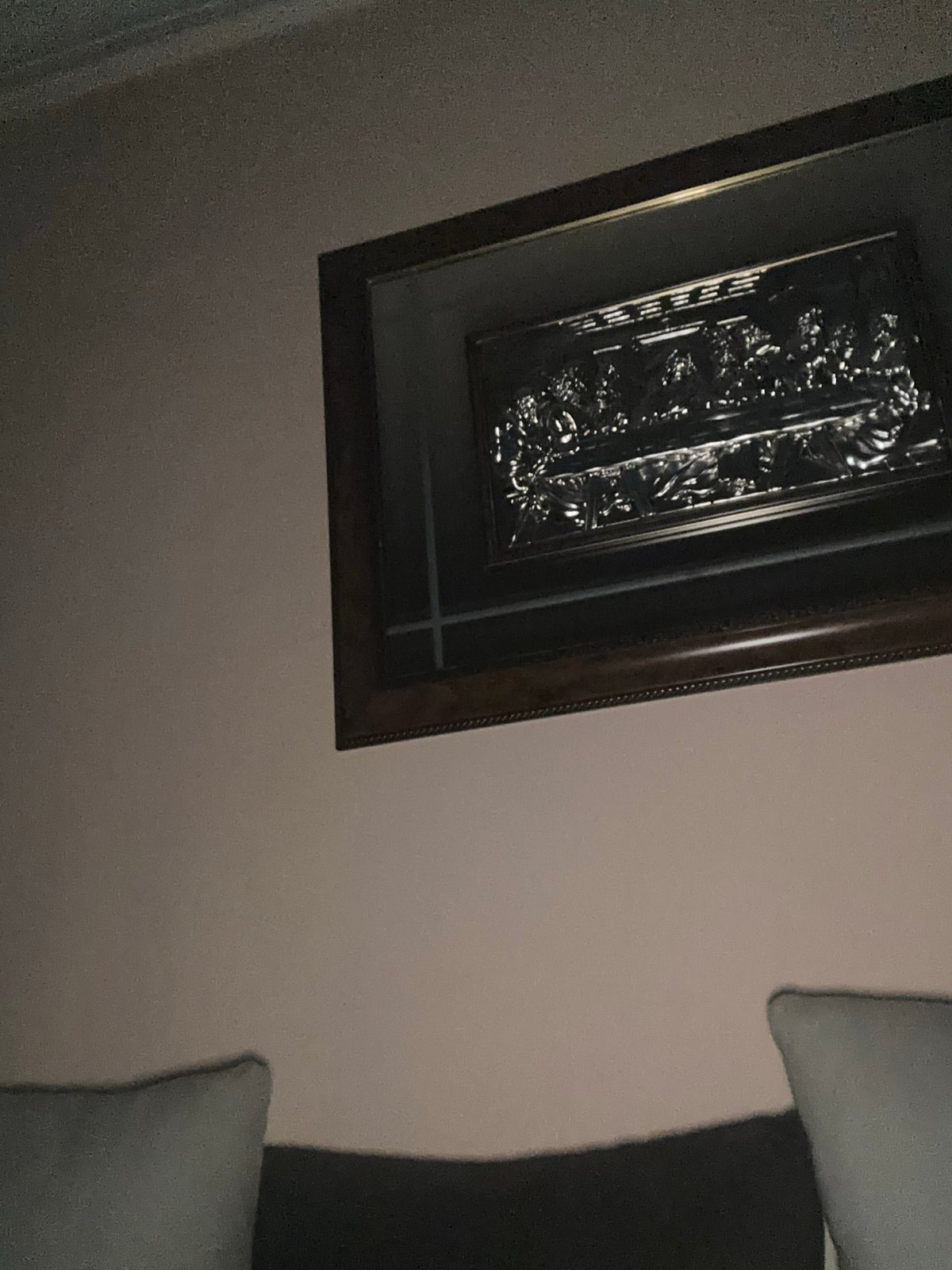 Person Documents Coca-Cola Bottle in Indoor Setting
