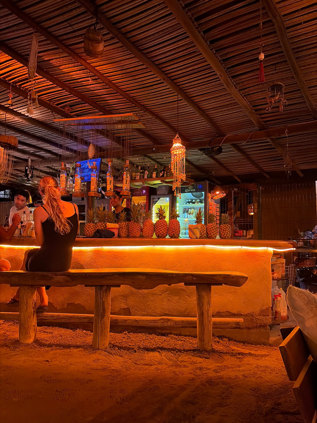 Dimly lit bar interior captured in Brisas de Zicatela