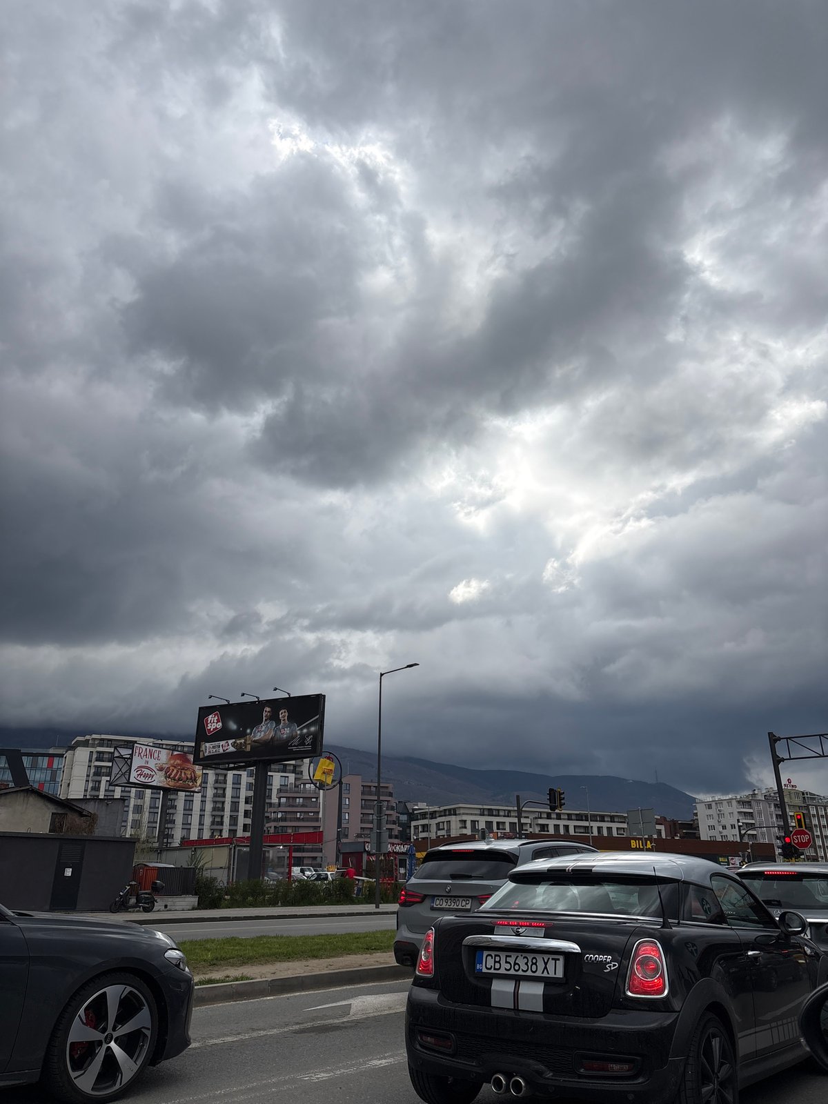 Regular traffic and parked vehicles observed in Sofia
