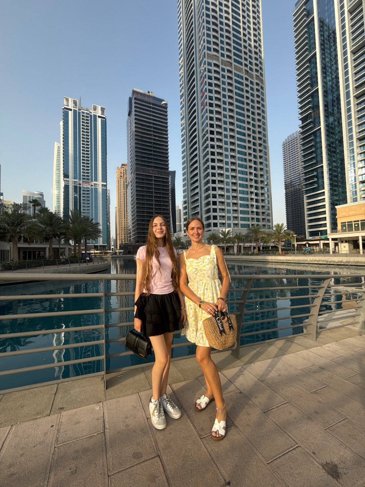 Afternoon stroll along a Dubai waterfront with city views
