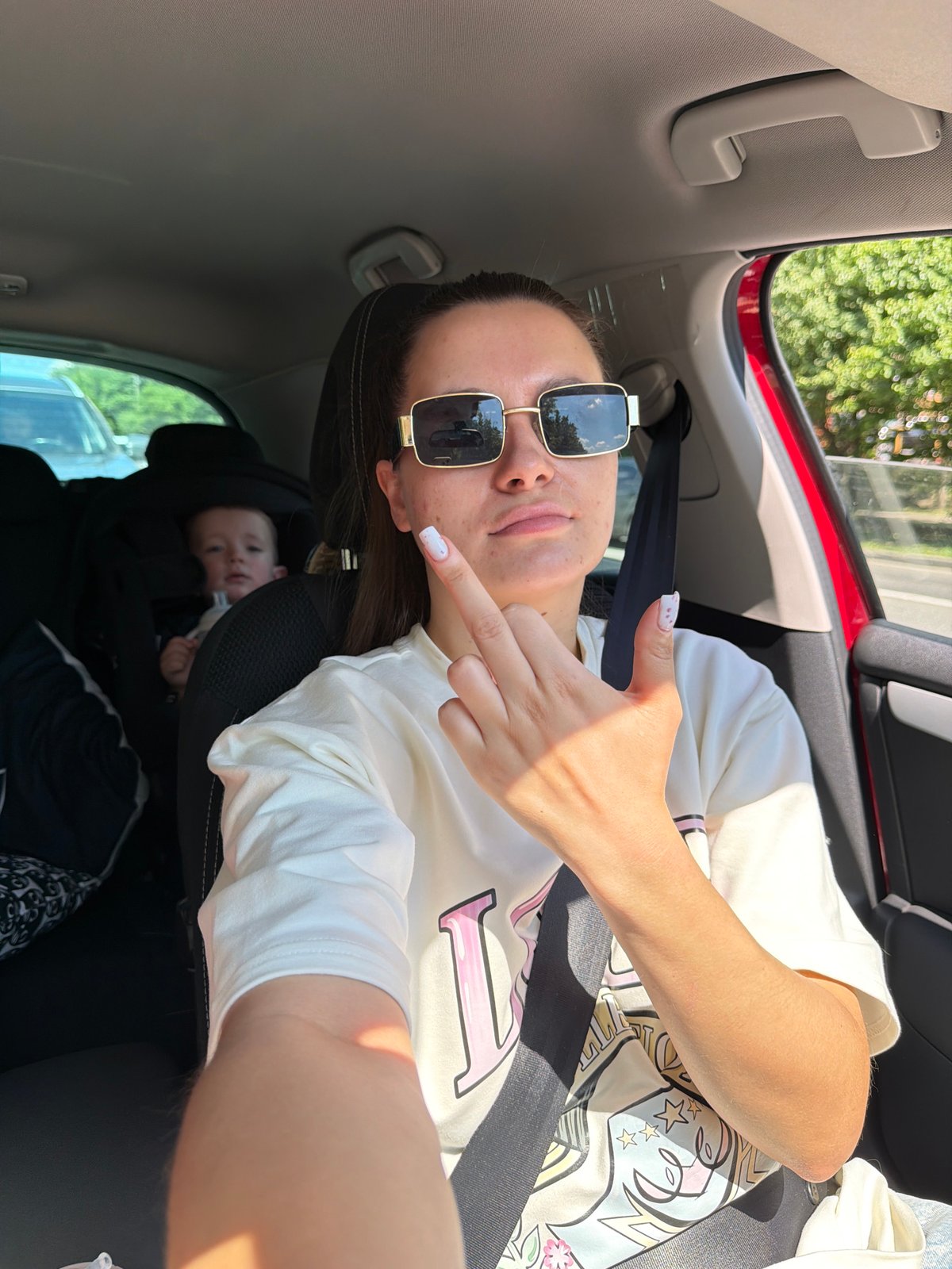 Woman Takes Selfies in Car in Odintsovo