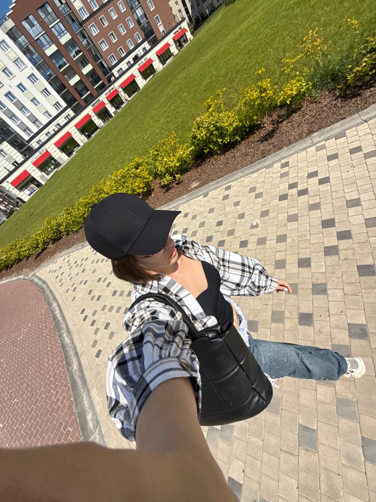 Young woman documents casual day outdoors in Russian cities