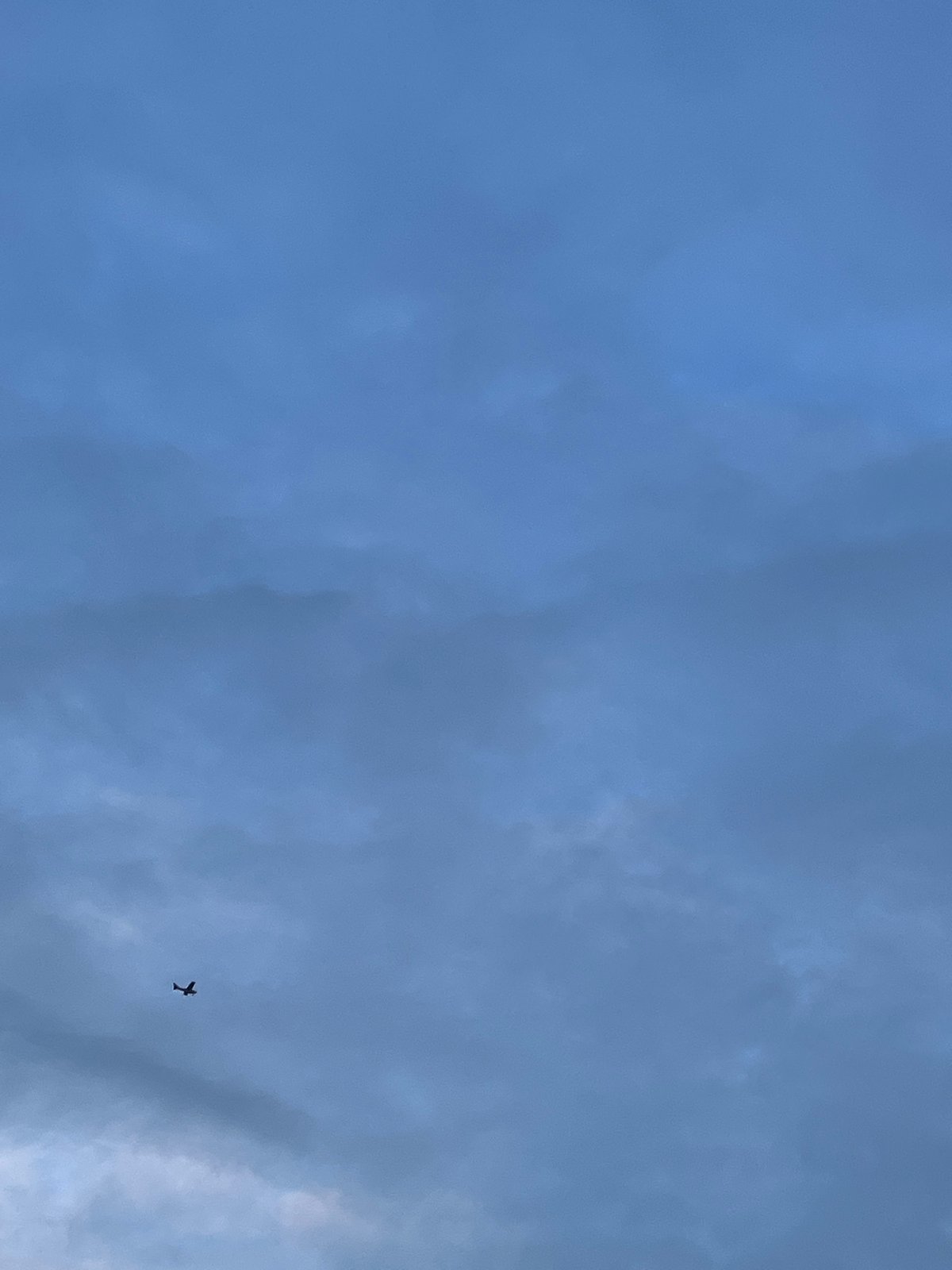 Quiet residential streets, construction, and sky-watching on a cloudy afternoon