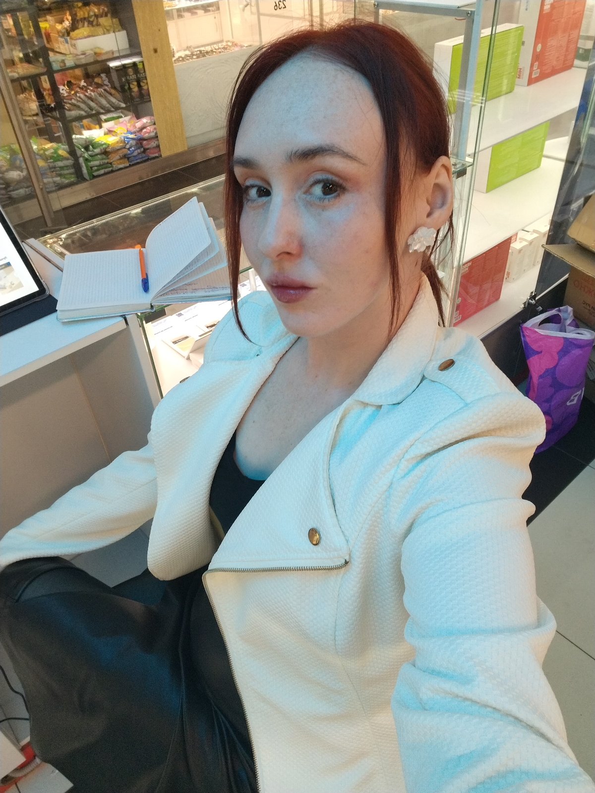 Woman takes selfies in Izhevsk retail store