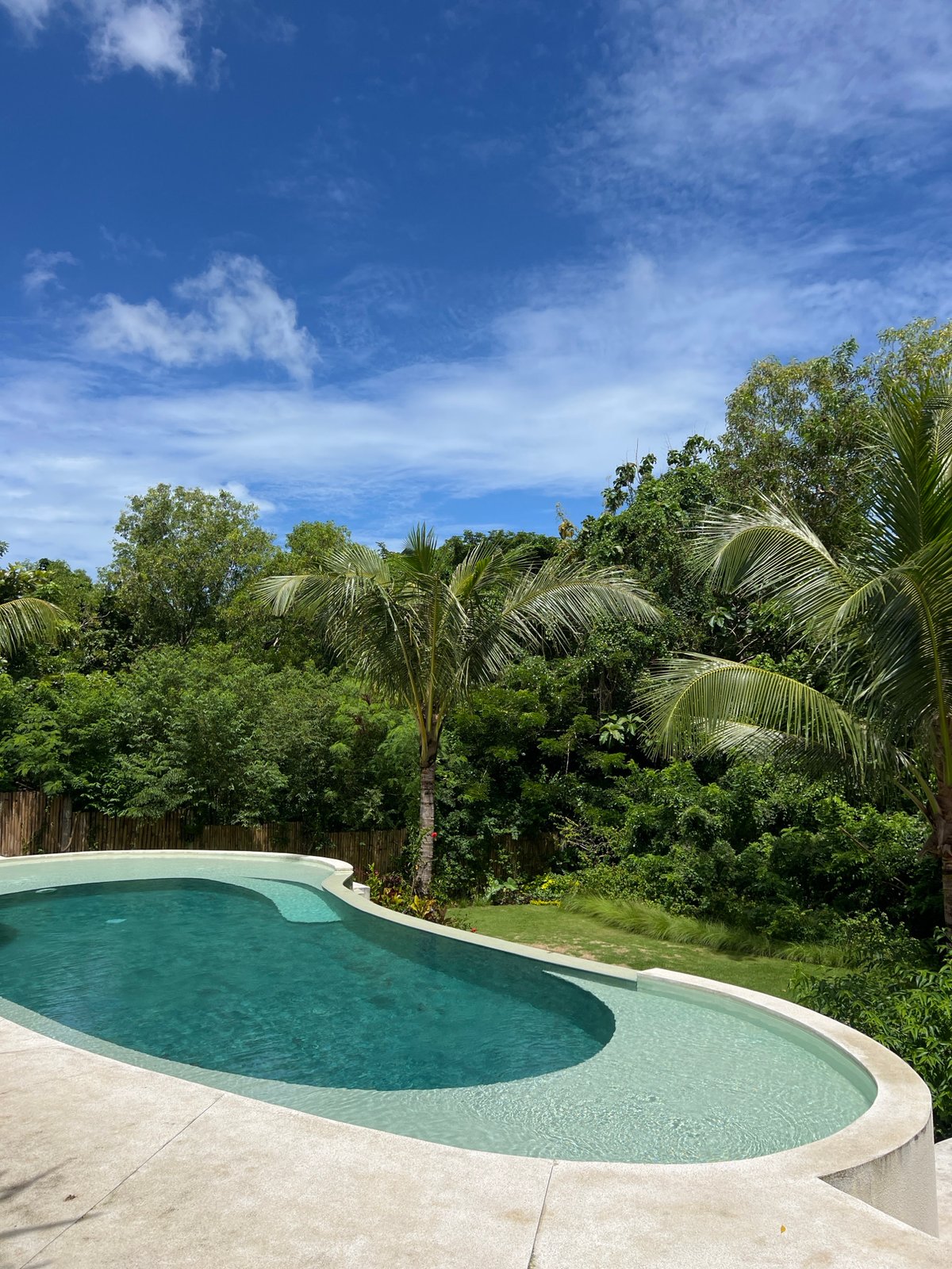 Morning poolside coconut drinks captured at Kuta Selatan resort