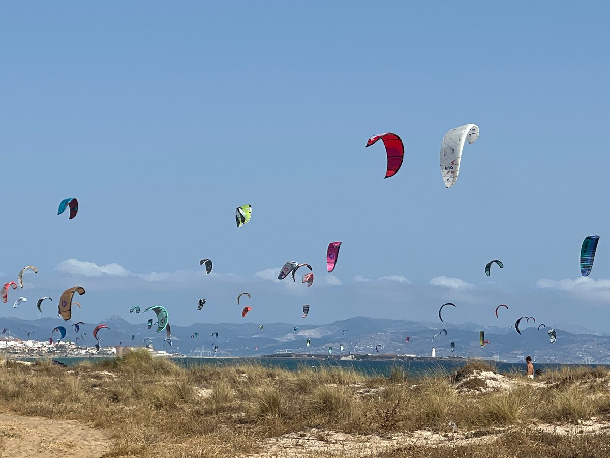 Busy kite beach day in Tarifa, Spain