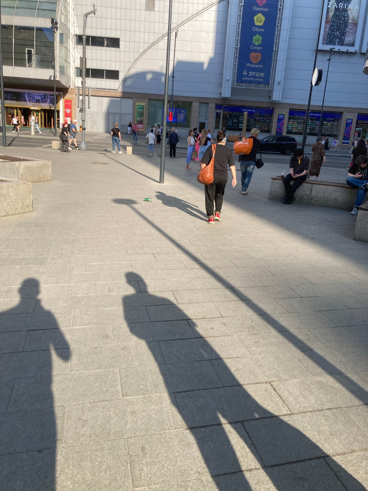 Pedestrians documented walking through central Moscow commercial district
