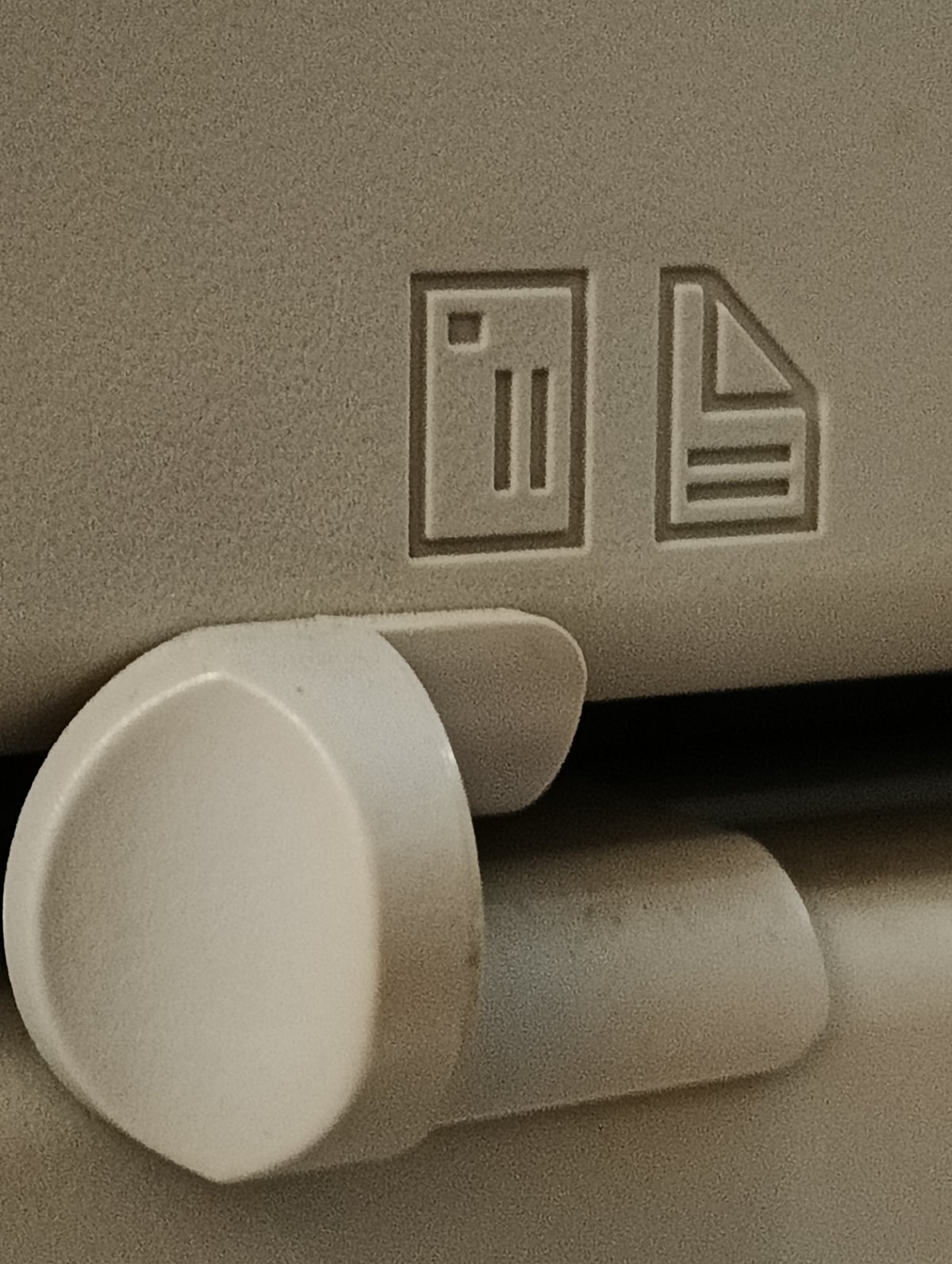 Individual documents household items in detailed close-up photography session