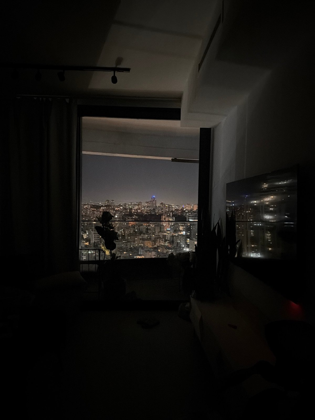 Nighttime cityscape viewed from multiple Tel Aviv area locations