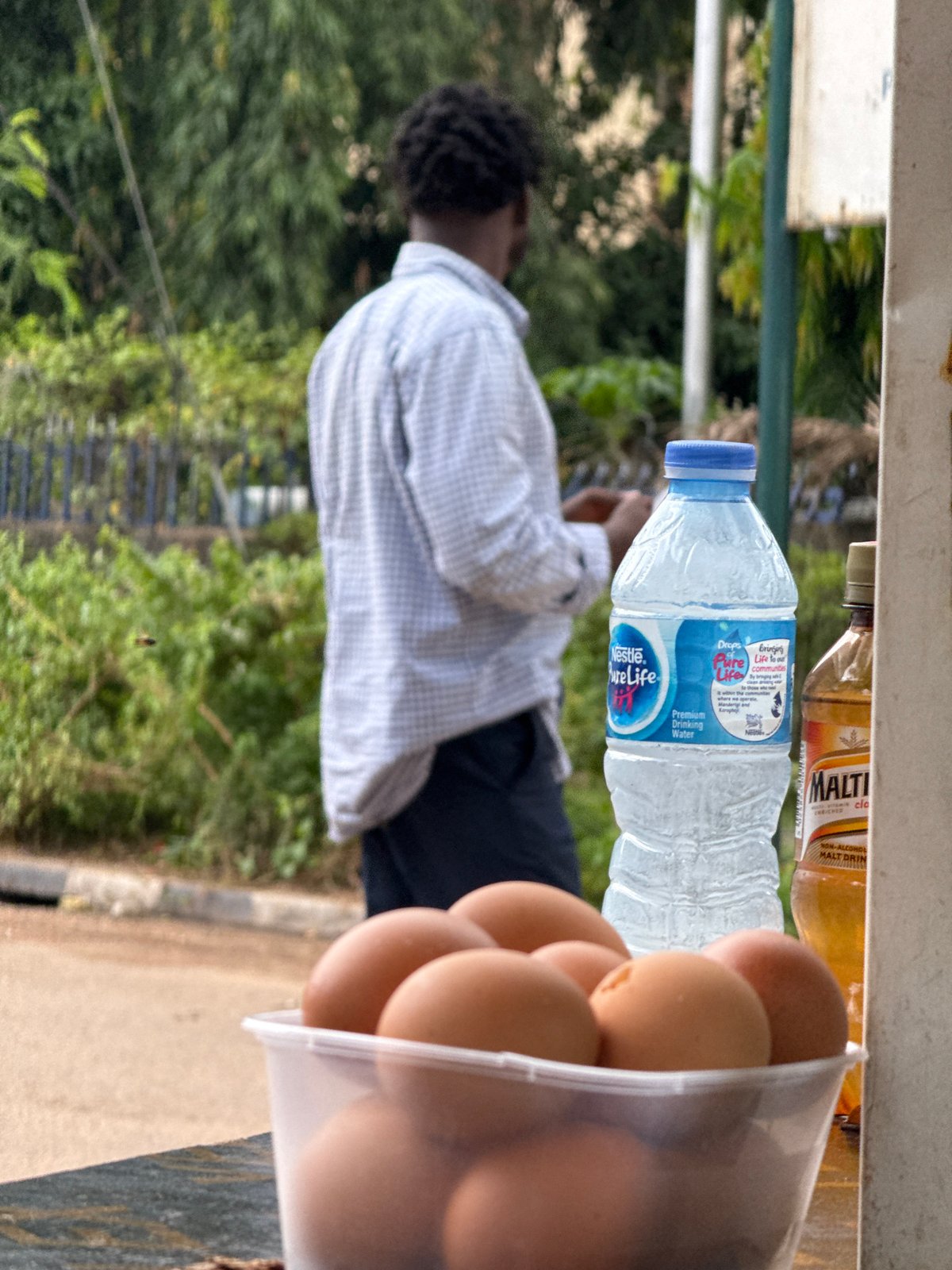 Morning street life and commerce in Abuja, Nigeria