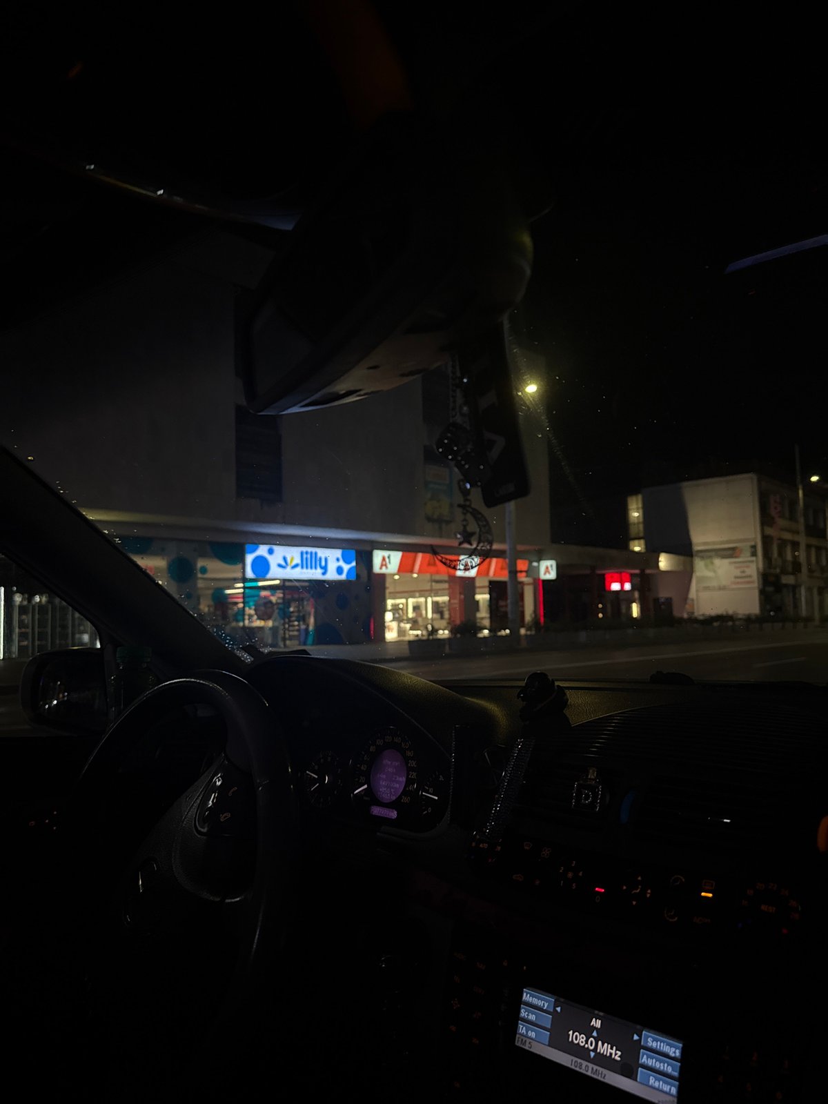 Nighttime drive through commercial district in Kazanlak, Bulgaria