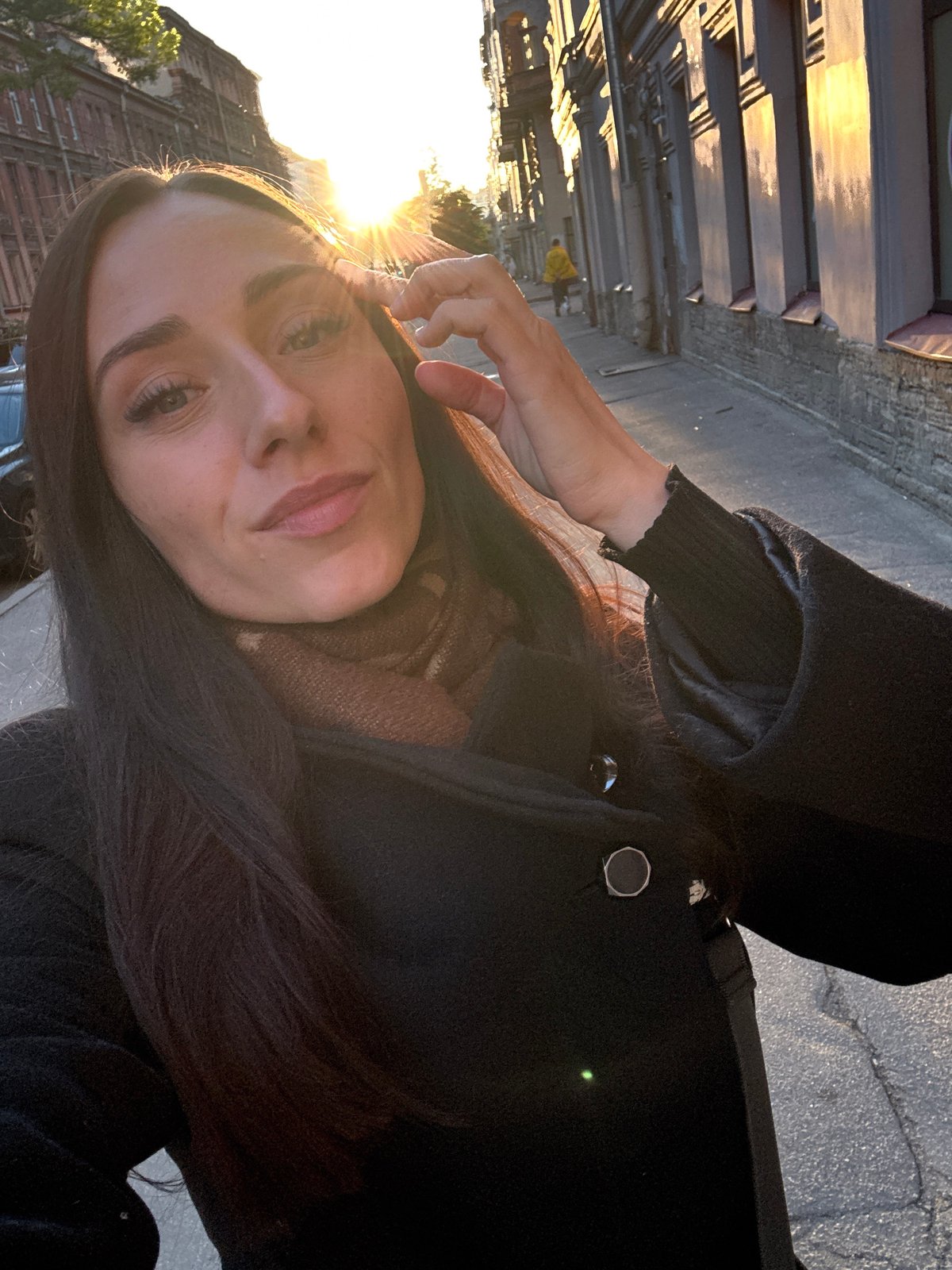 Woman documents sunset architecture tour in Saint Petersburg