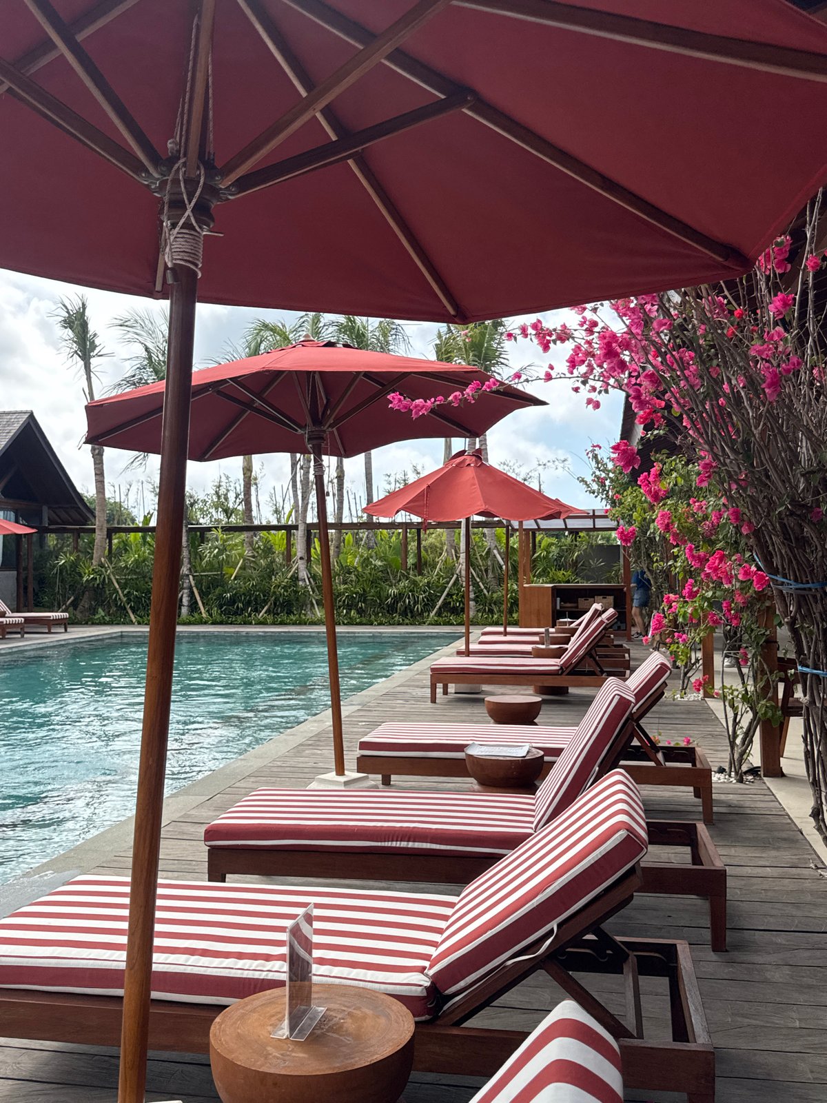 Poolside meditation moment captured in Kuta Selatan resort area