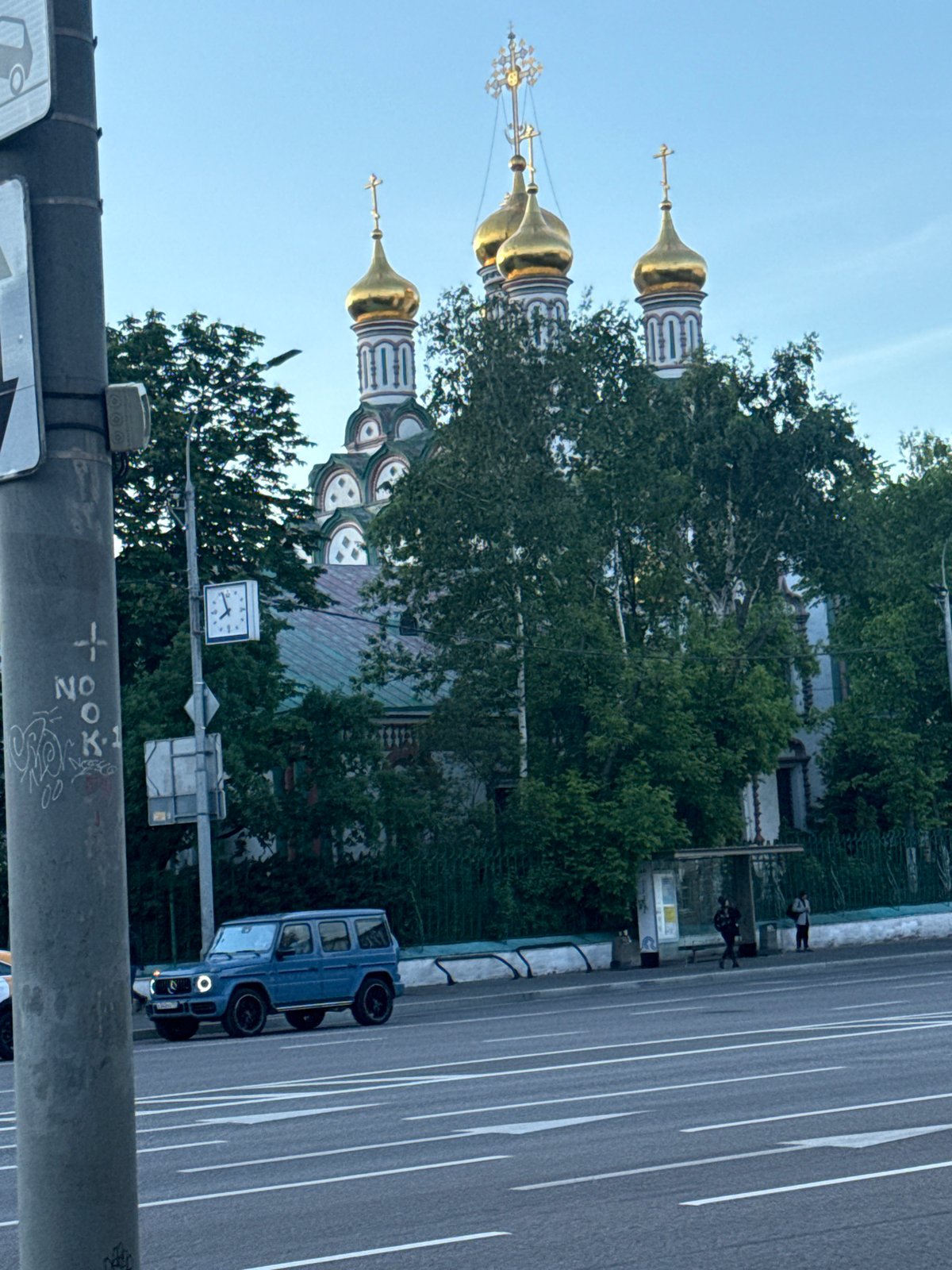 Moscow afternoon scenes: church, clouds, restaurant food preparation