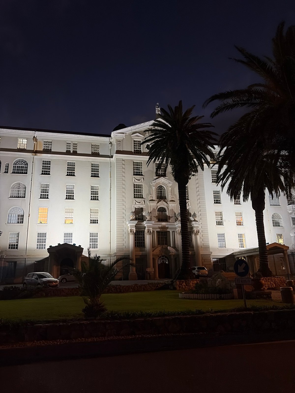 Illuminated building observed at night in Cape Town