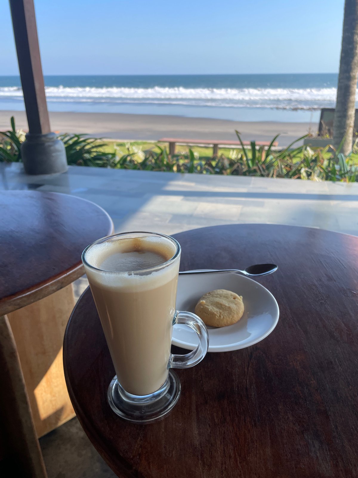 Lazy beach café morning at a Bali resort with ocean views