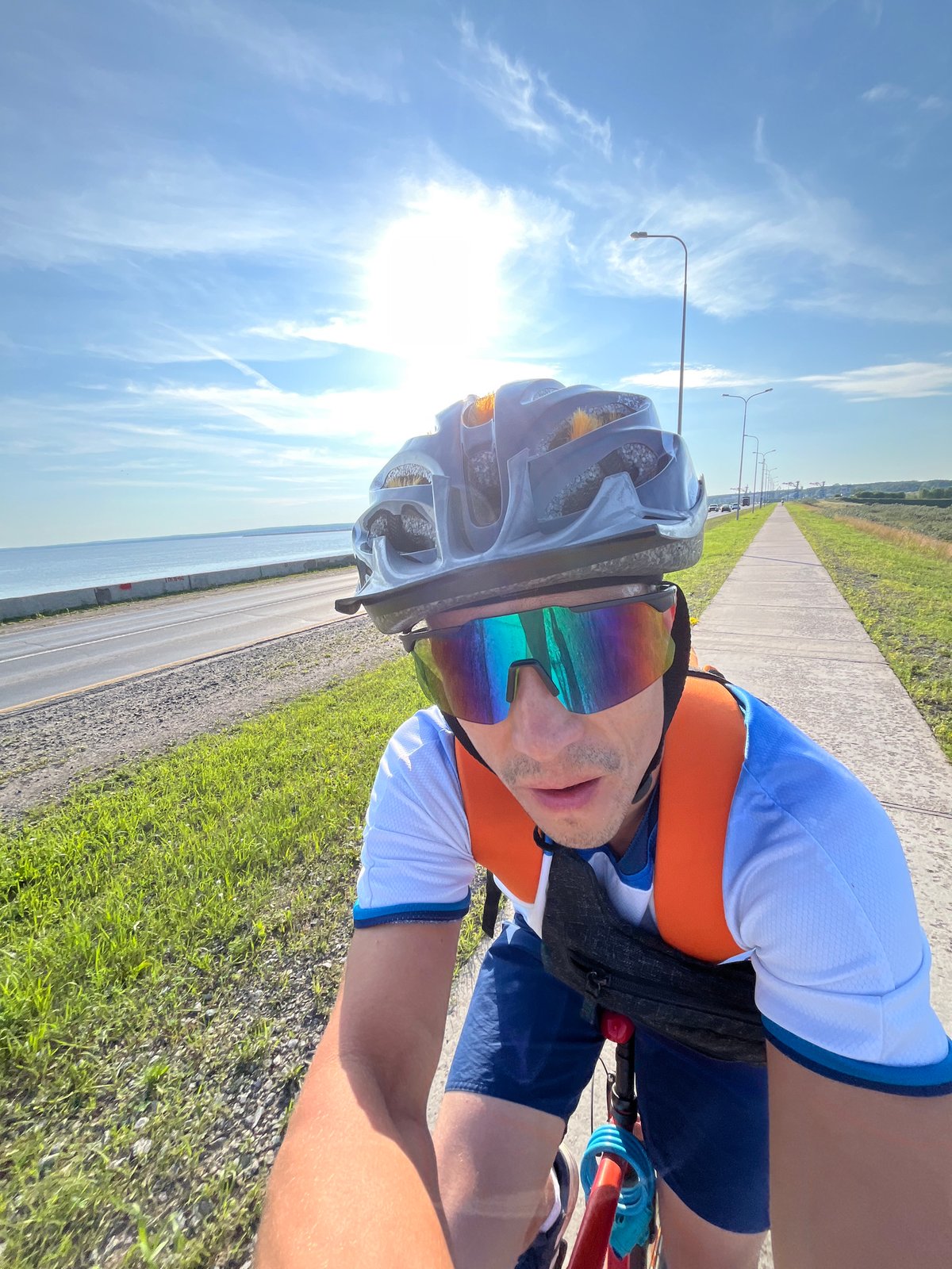 Cycling along a roadside path in Chaikovsky, Russia