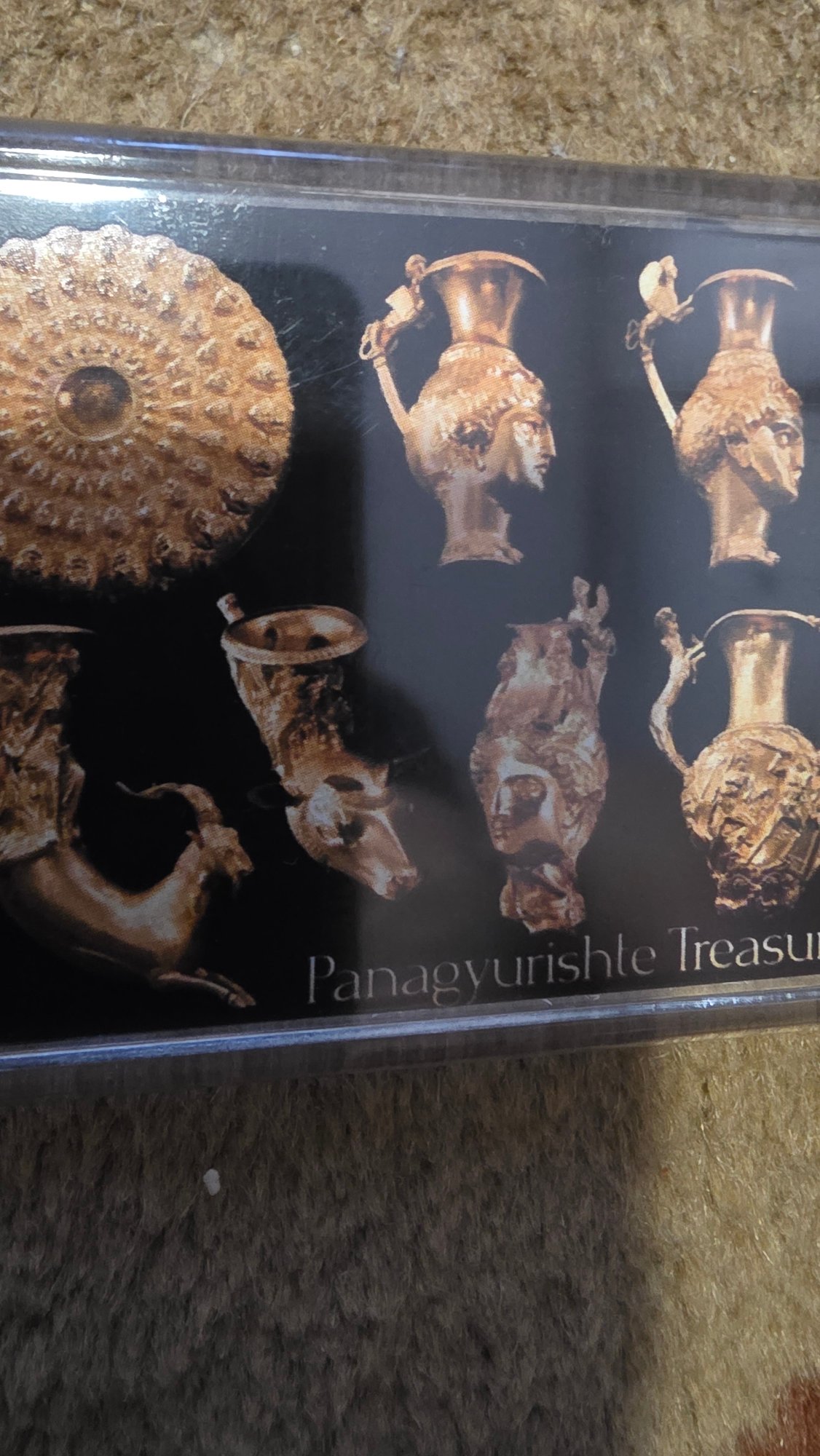 Museum visitor views Thracian gold treasure display in Bulgaria