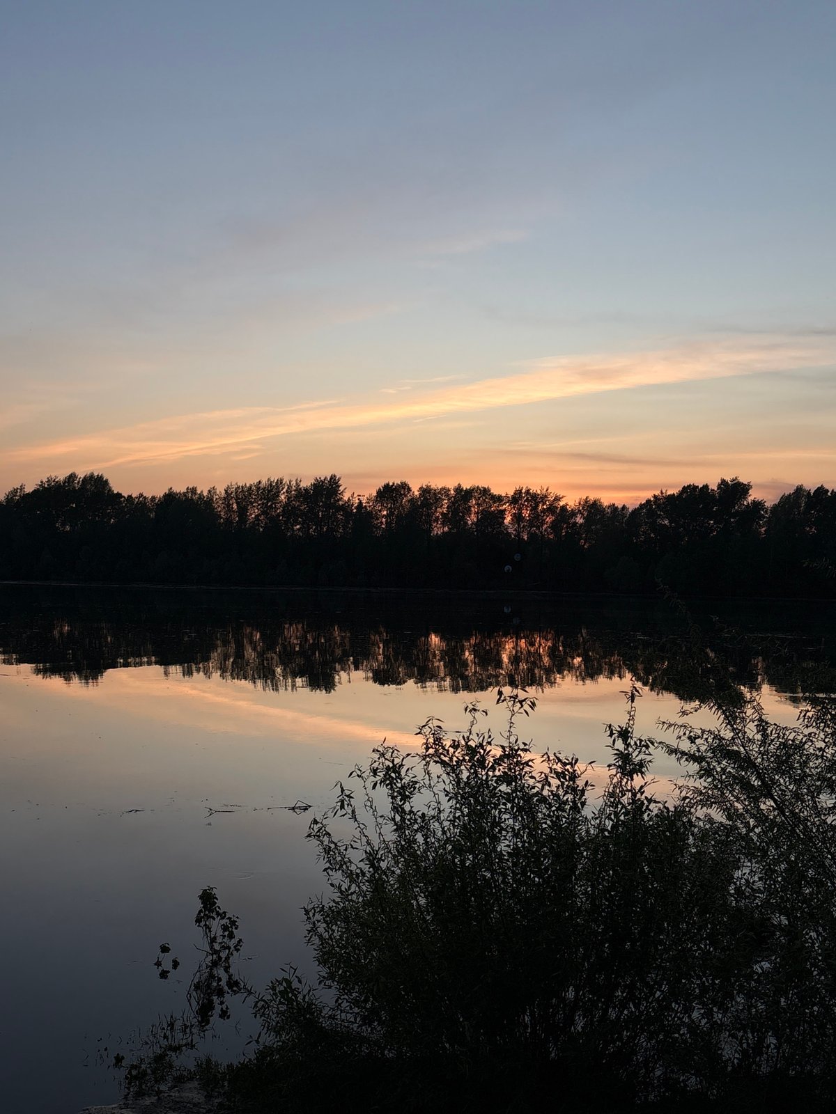 Evening fishing and leisure activities documented in Chaikovsky, Russia