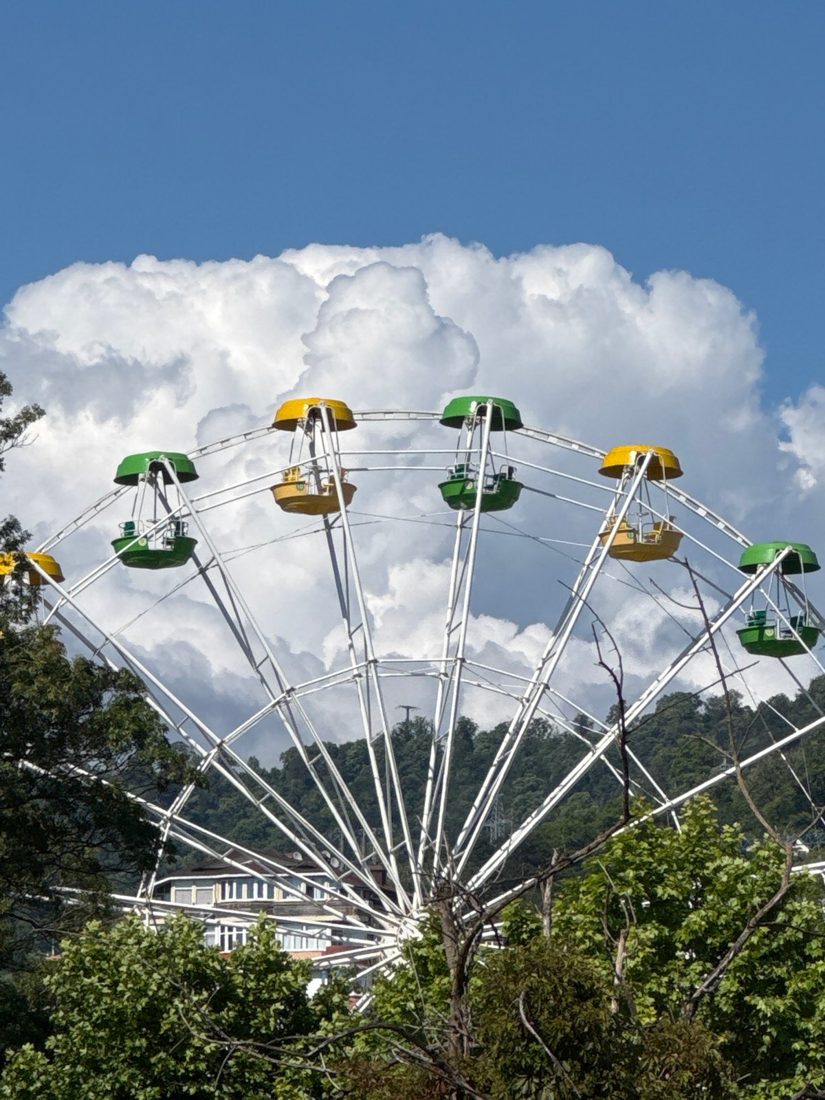Ferris wheel and highway driving near Sochi