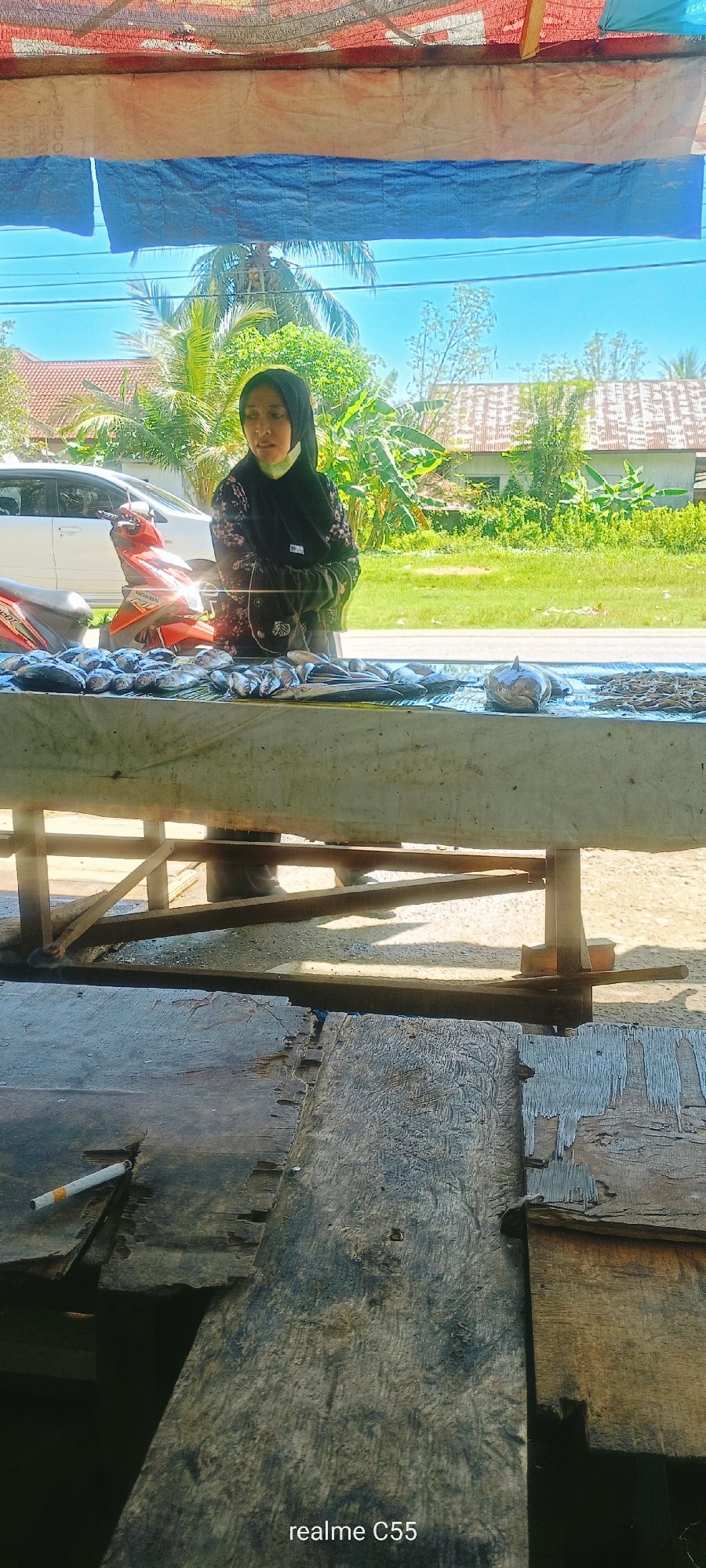 Early morning fish market operates in Lhokseumawe, Indonesia